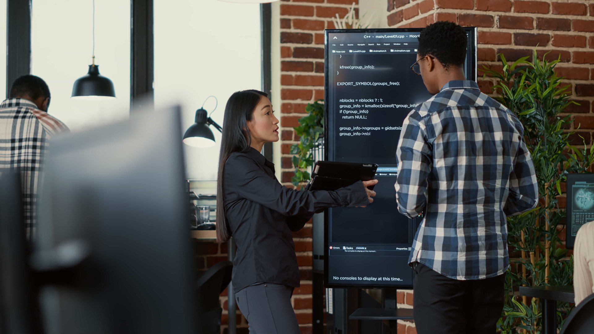 Acendeo Custom Web Developer services team explaining the solutions to a client