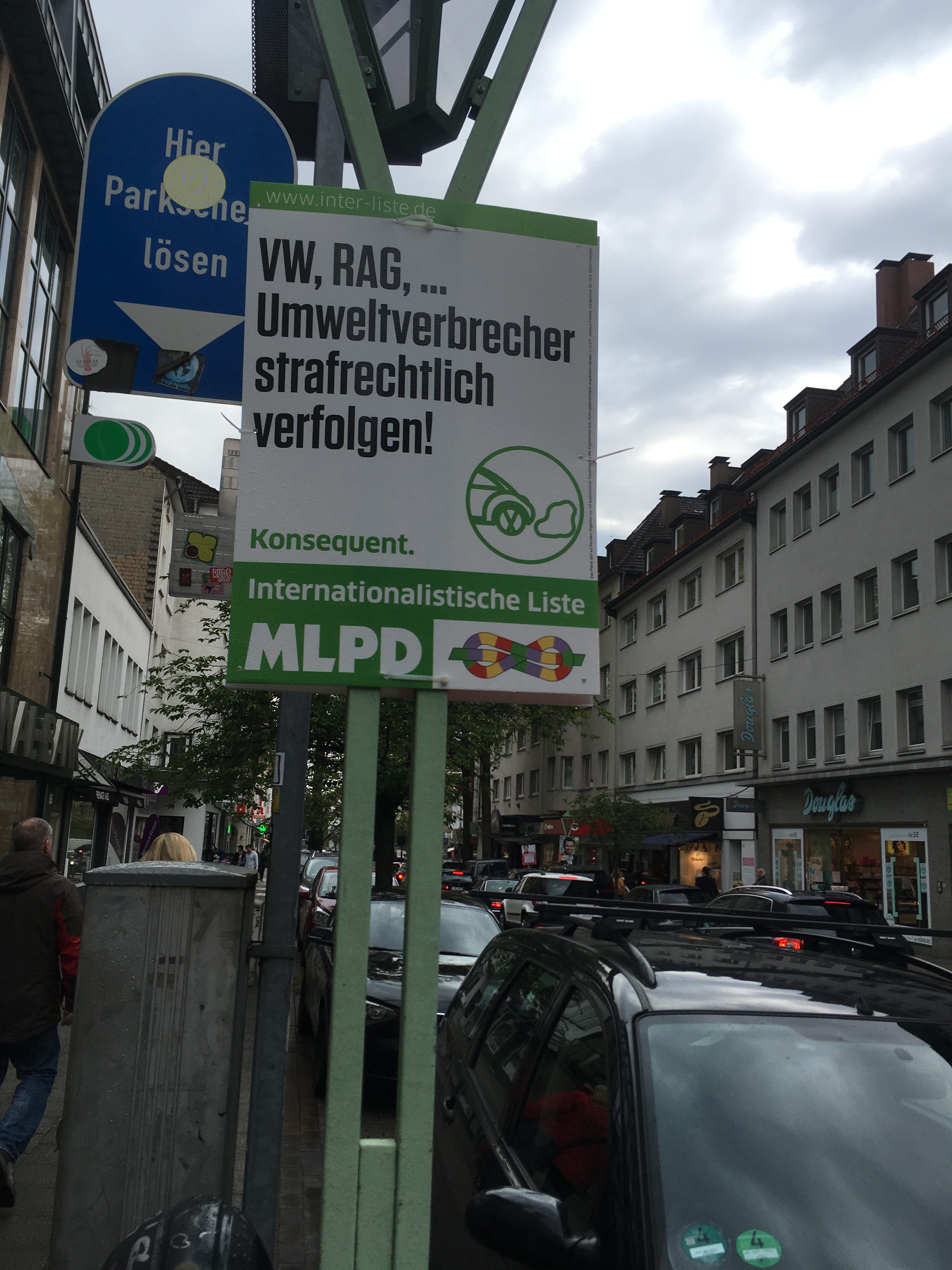 "VW, RAG... Prosecute environmental criminals!" (RAG is the mining company in town)