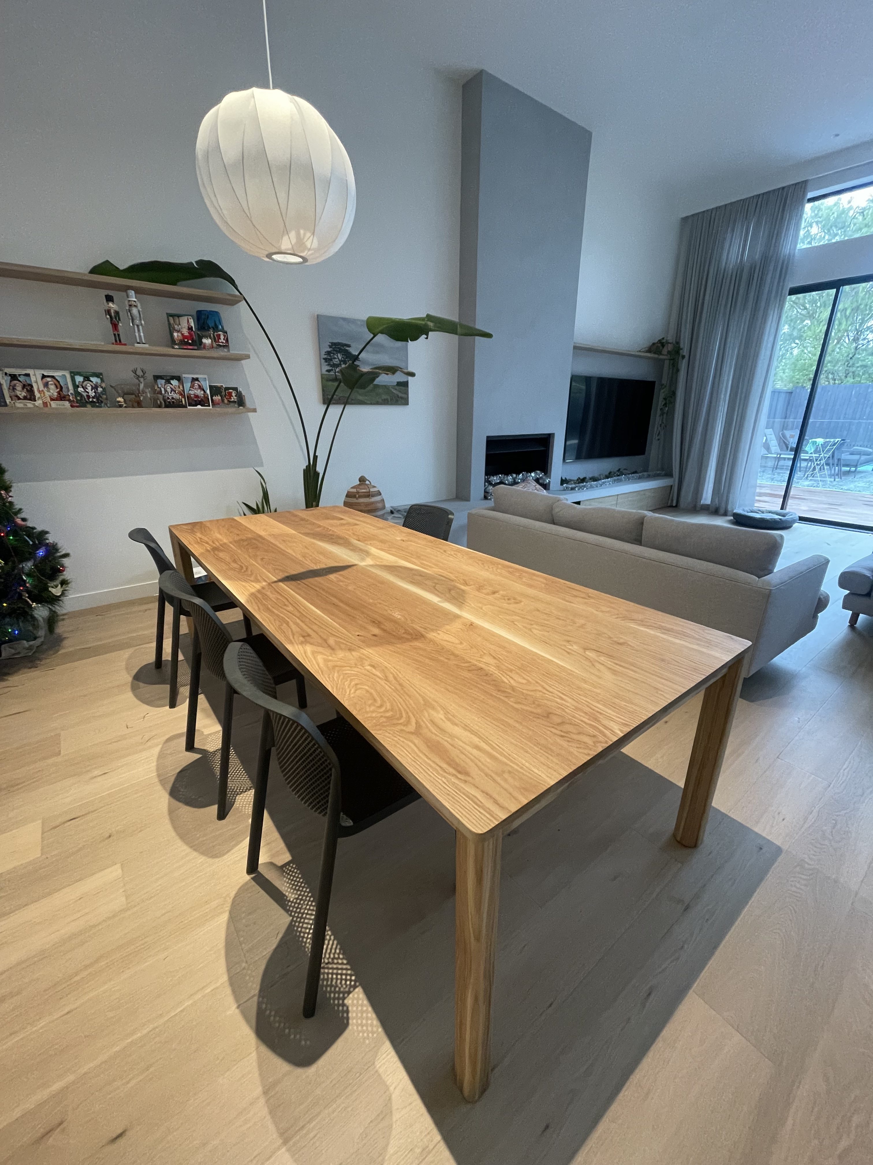 American oak dining table with curved legs