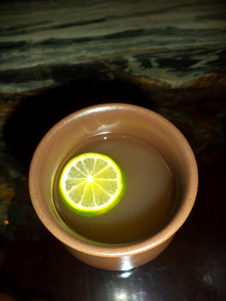 Ginger lemon drink before spa massage