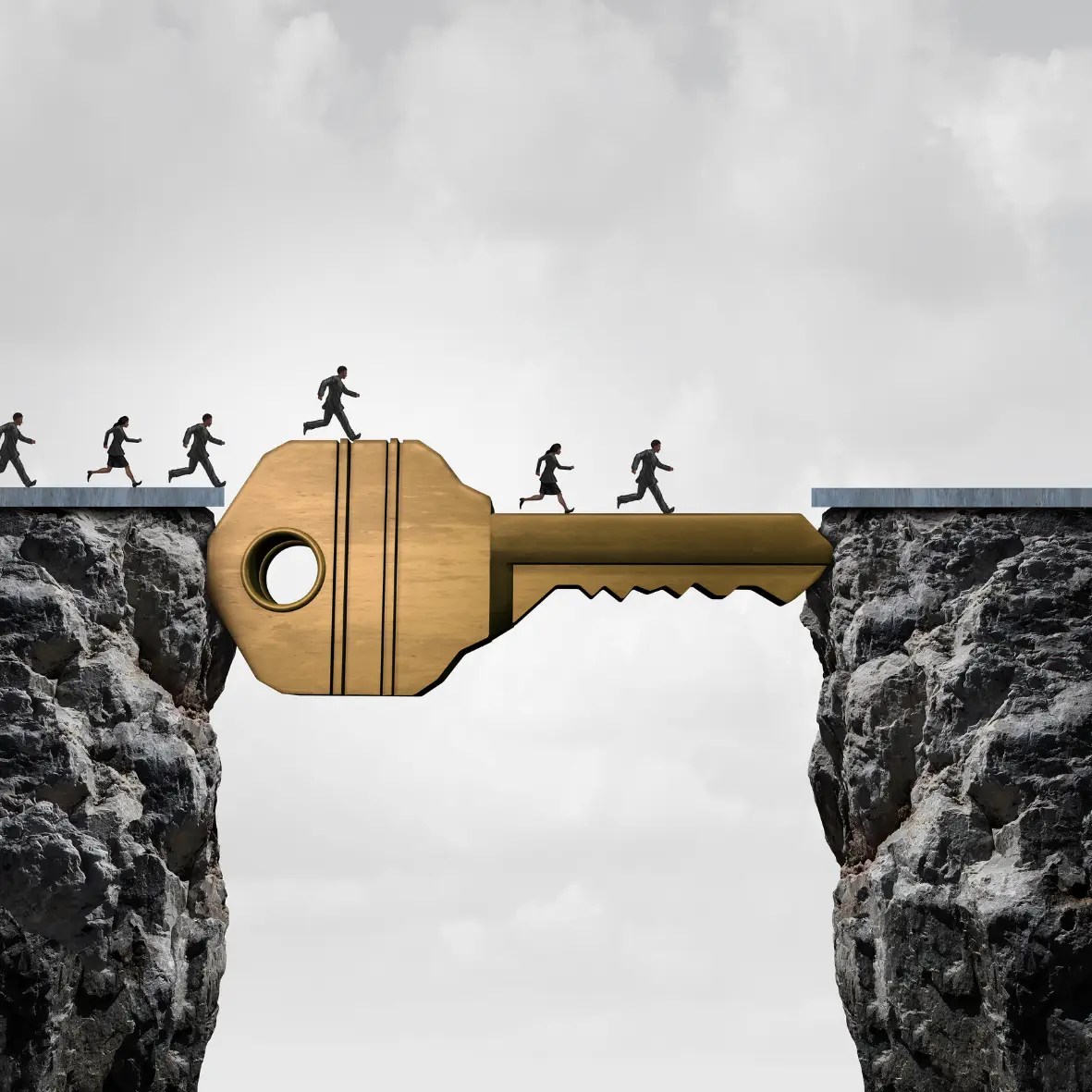 Une clé est entre deux rochers et des gens passe par dessus pour symboliser un objectif commun.