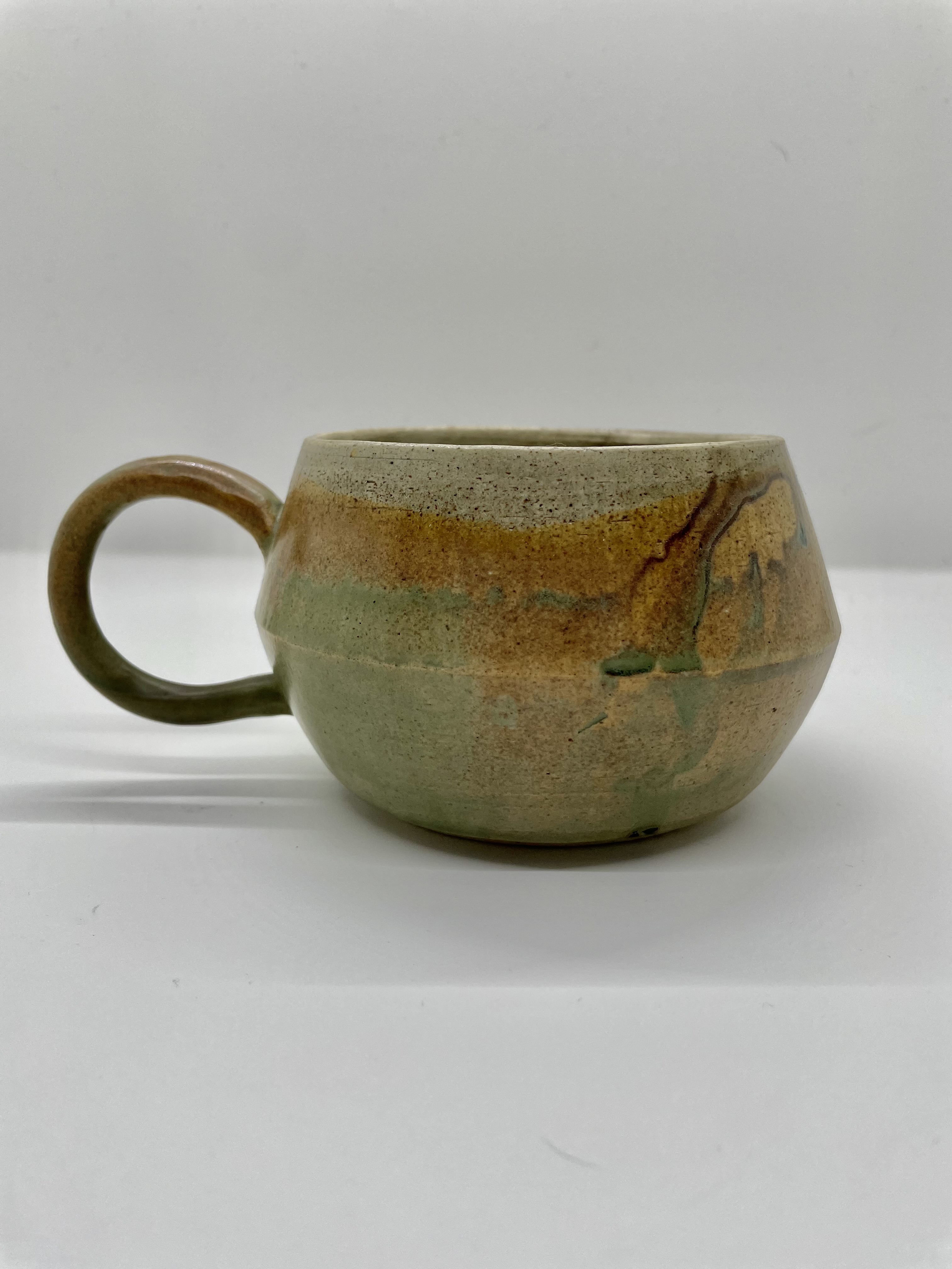 "Running Thoughts in Tan And Blue" ceramic mug, by Brickstone Ceramics