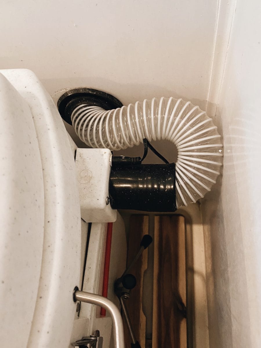 rubber grommet for natures head toilet in van shower through FRP wall