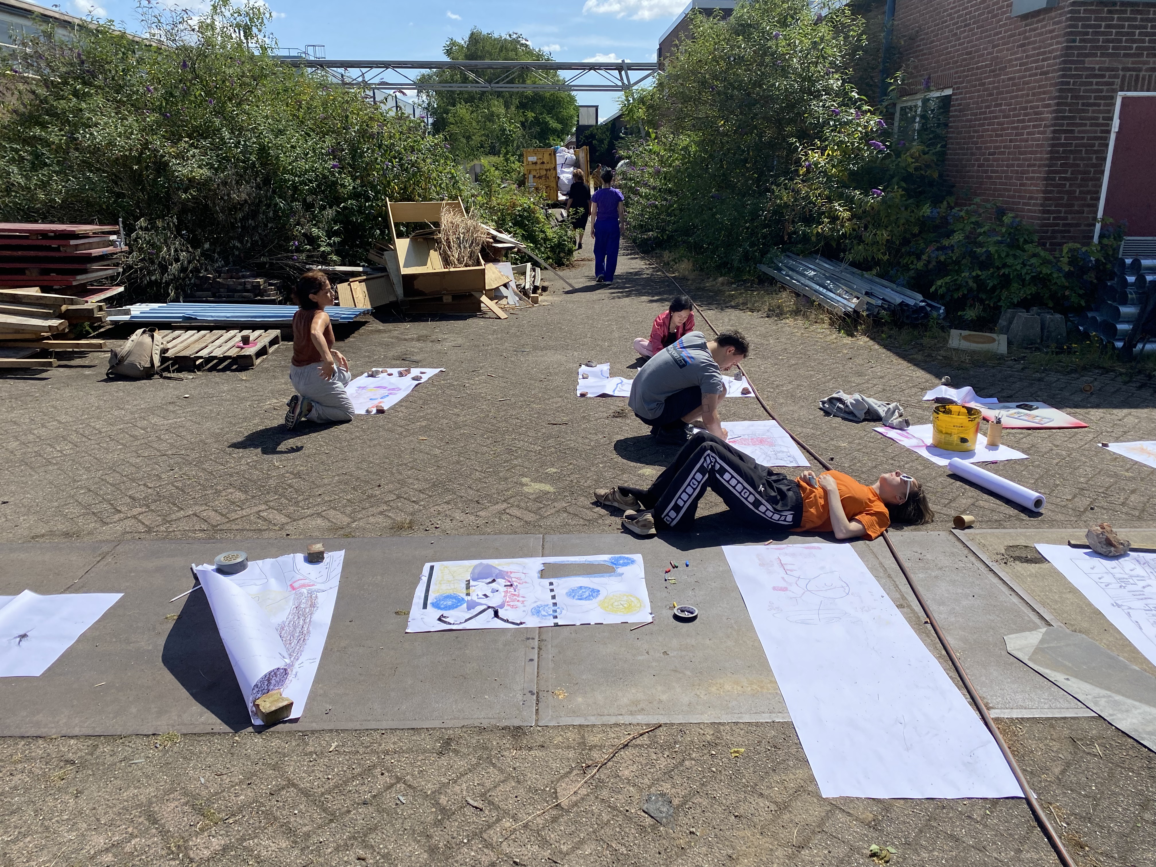 Artists Adam Moore and Lotte Van Gelder facilitating drawing with site at Destination Unknown 2023 © Adam Moore.
