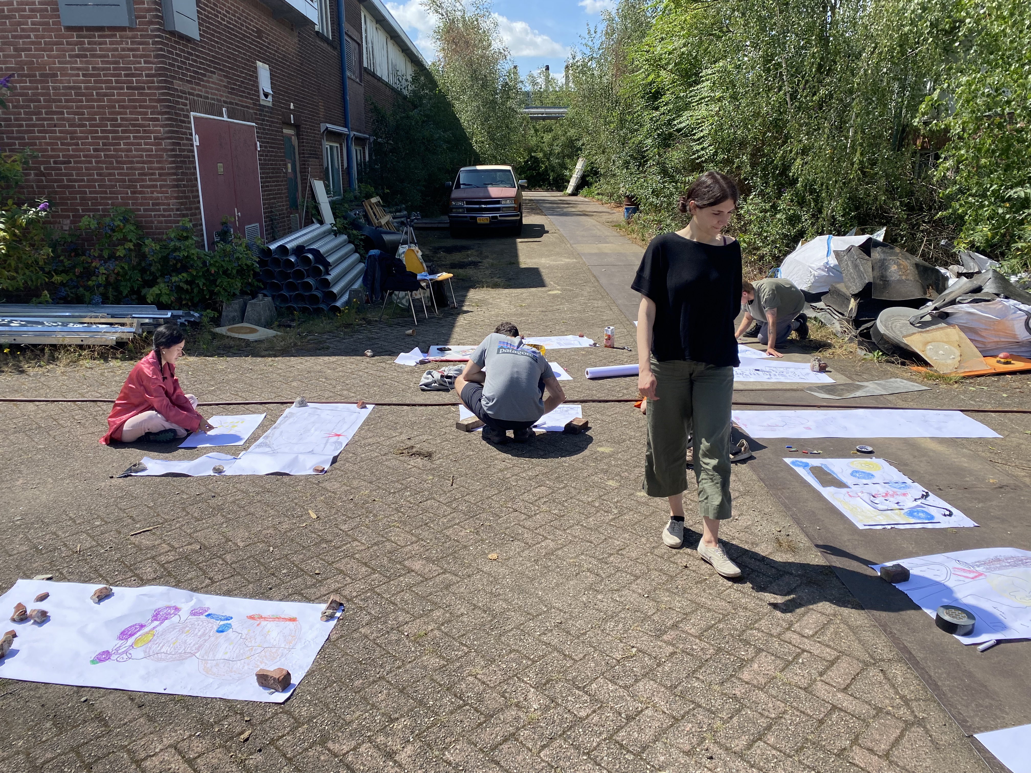 Artists Adam Moore and Lotte Van Gelder facilitating drawing with site at Destination Unknown 2023 © Adam Moore.