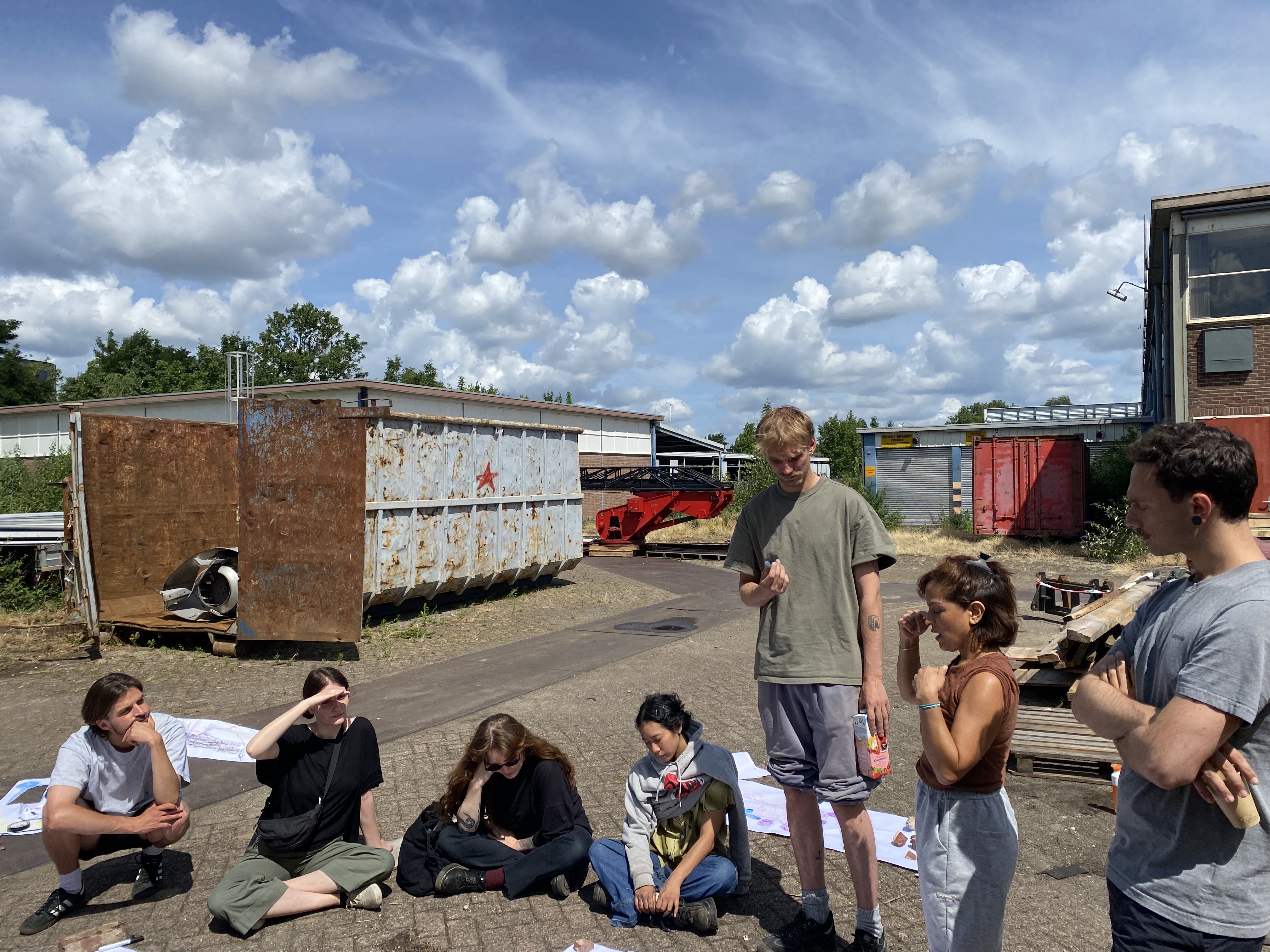 Artists Adam Moore and Lotte Van Gelder facilitating drawing, writing and spaeking with site at Destination Unknown 2023 © Adam Moore.