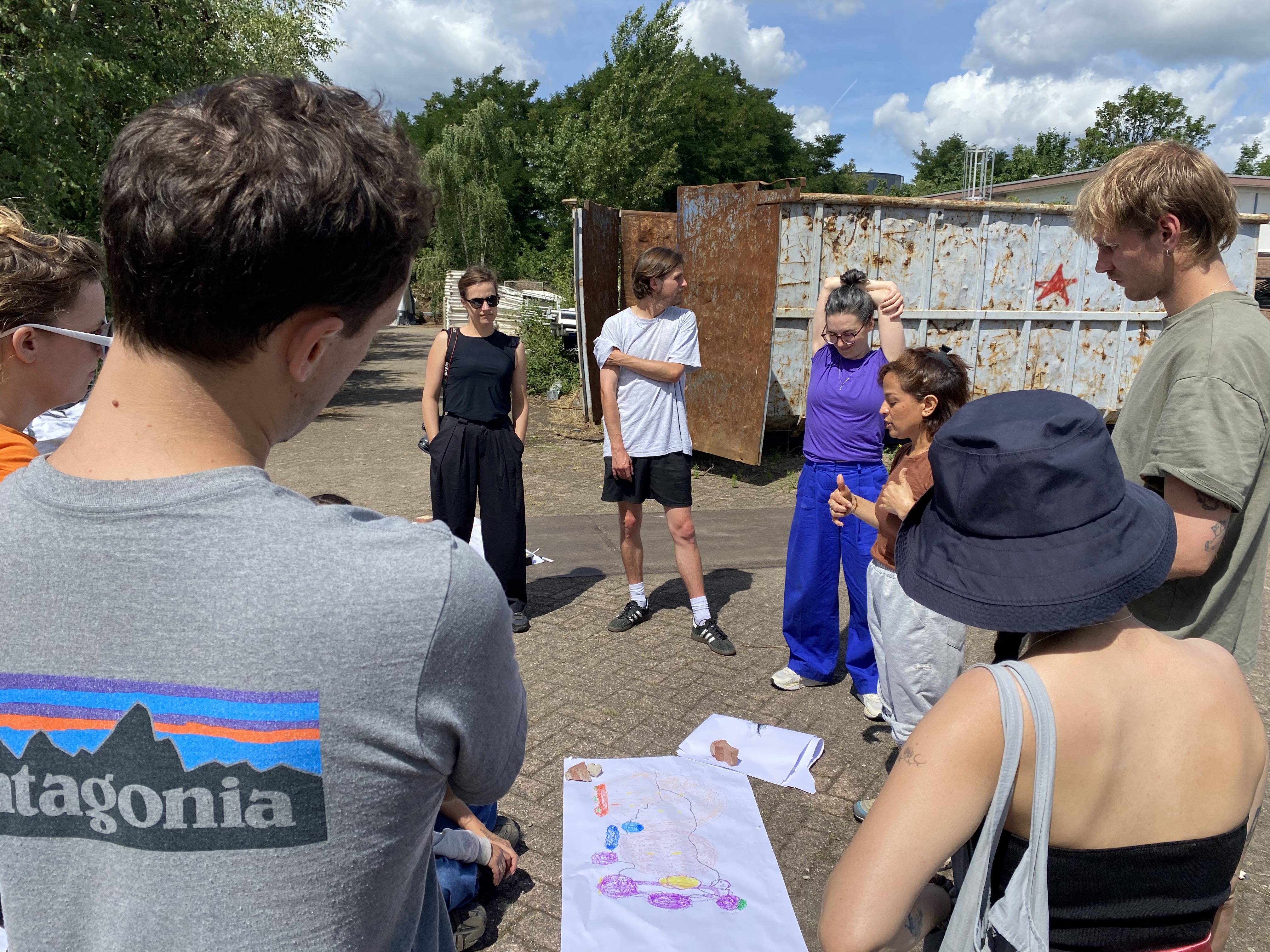 Artists Adam Moore and Lotte Van Gelder facilitating drawing, writing and spaeking with site at Destination Unknown 2023 © Adam Moore.