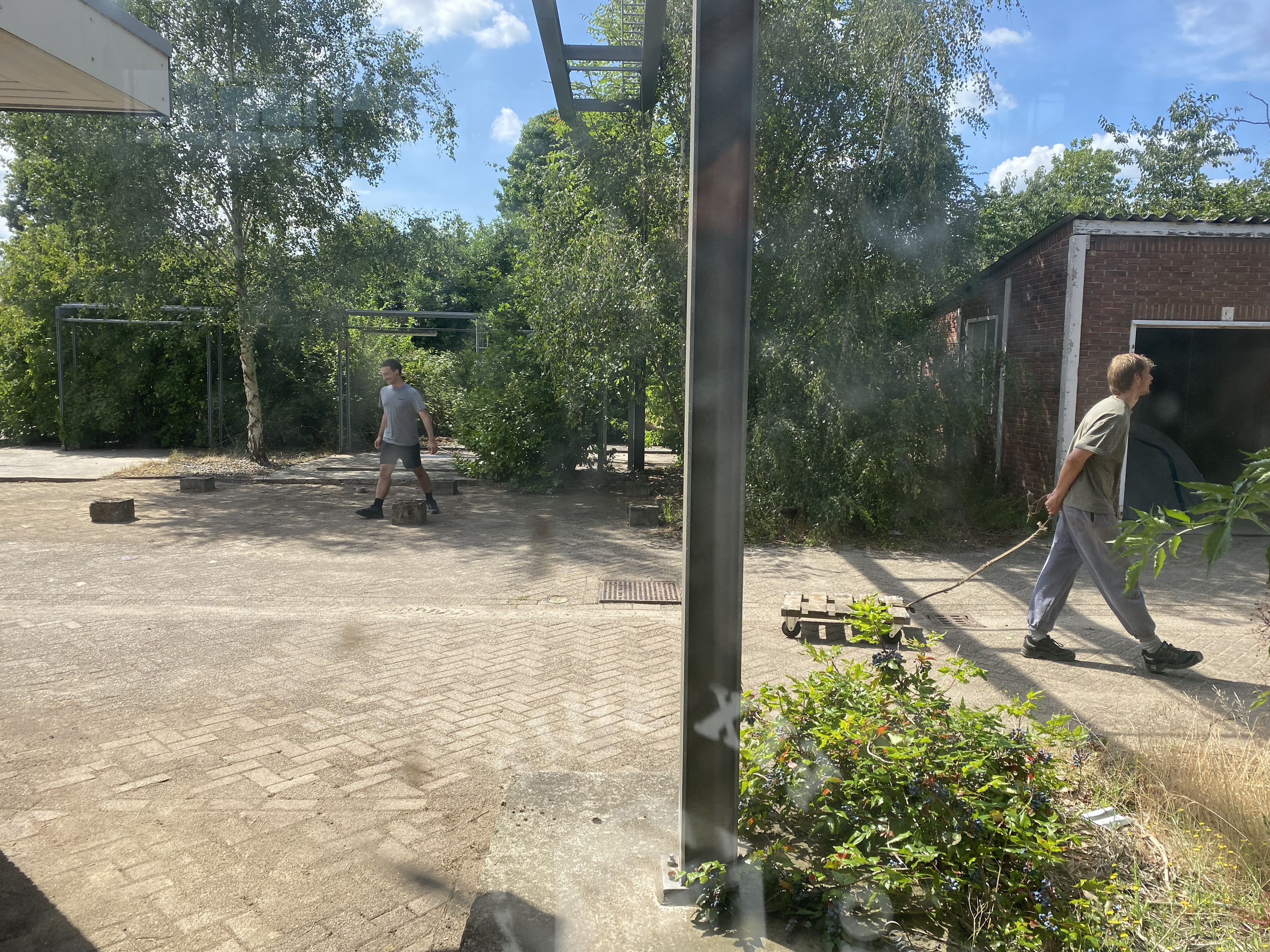 Artists Adam Moore and Lotte Van Gelder facilitating curating with site with Destination Unknown 2023 artists Michele Bazzoli, Sjors Smit © Adam Moore.