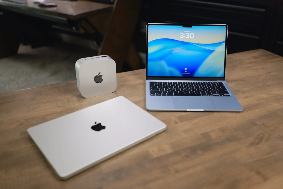 MacBook, Mac mini, and Mac Studio on a desk