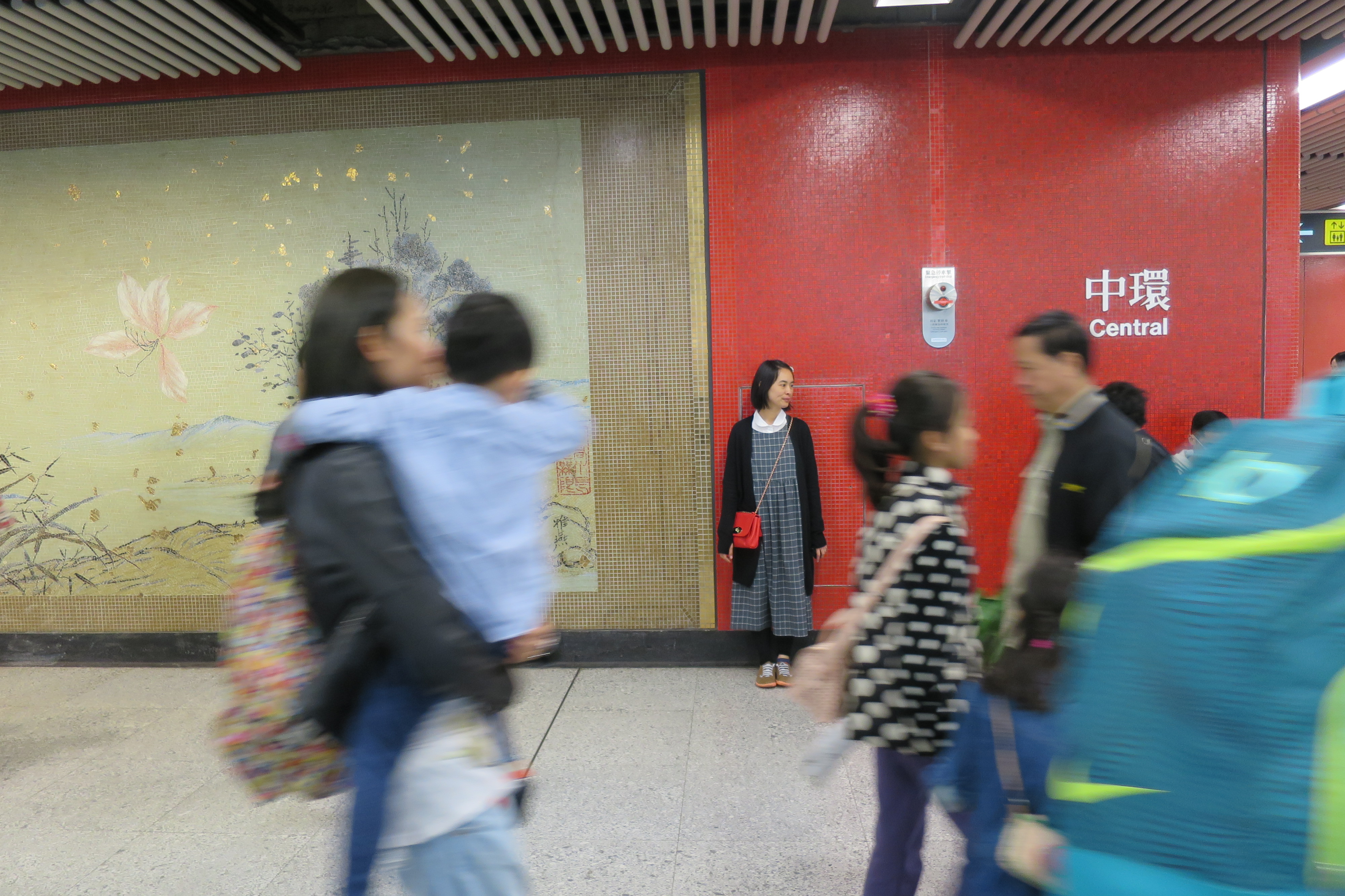Central is interchange station, they intended to use firebrick red color to capture attention of the passengers.
