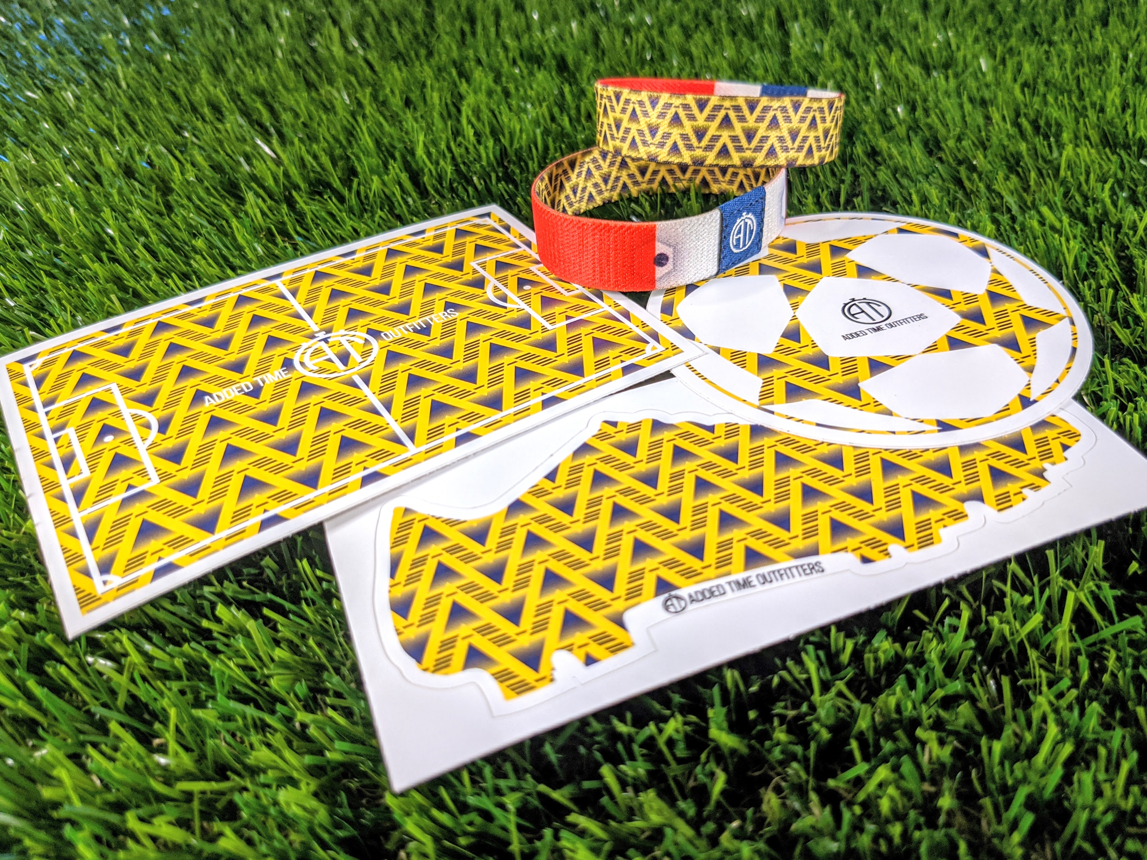 Clinching Invincible stickers and wristbands