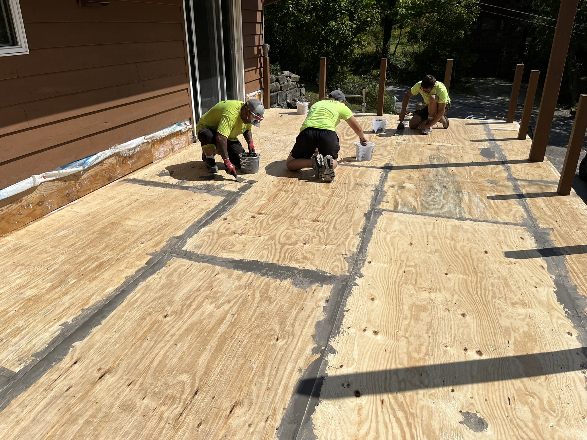 Professionally installed Tufdek waterproof decking for balconies and rooftop decks