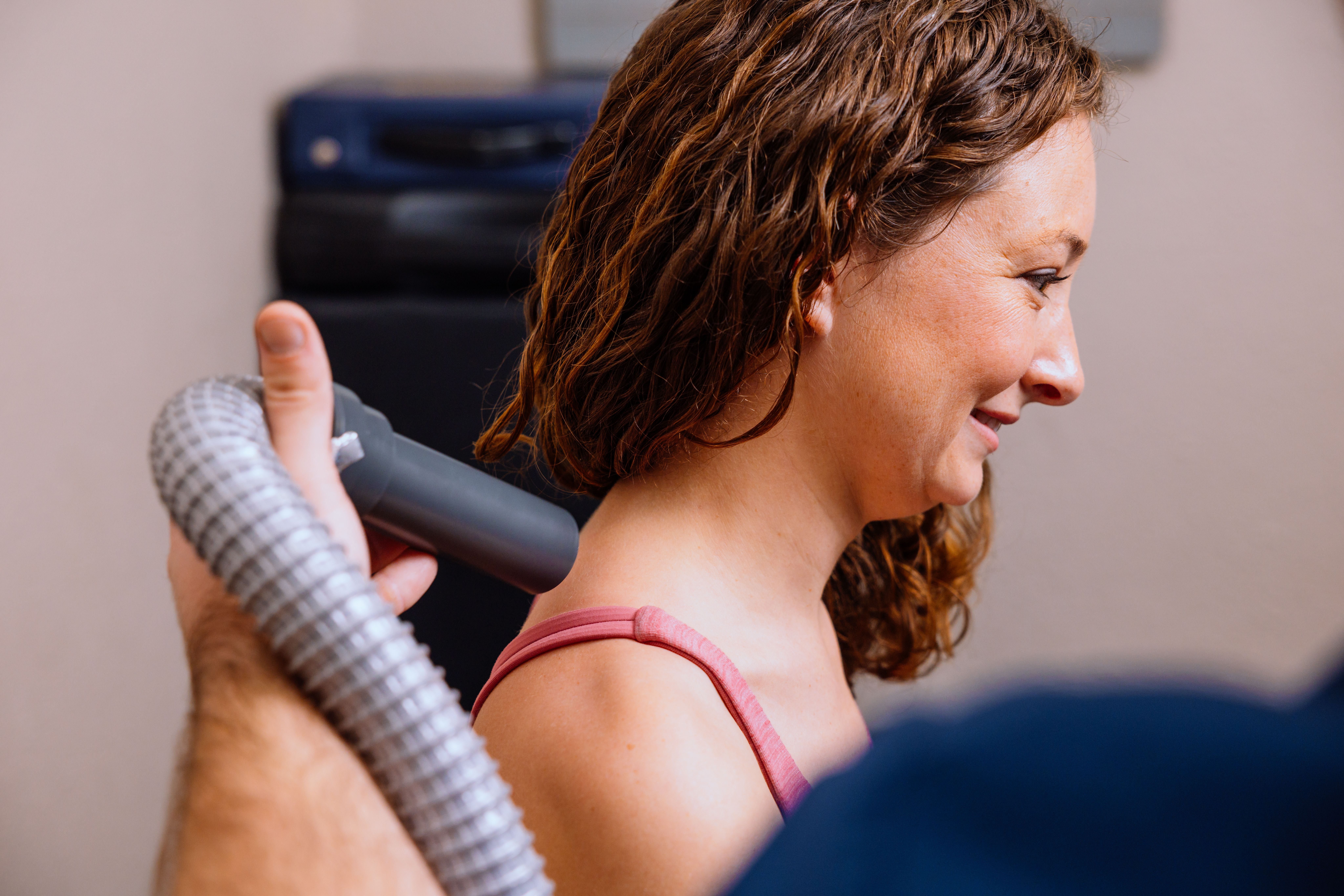 Localized cryotherapy session on neck for pain relief at Advanced Recovery Cryotherapy.