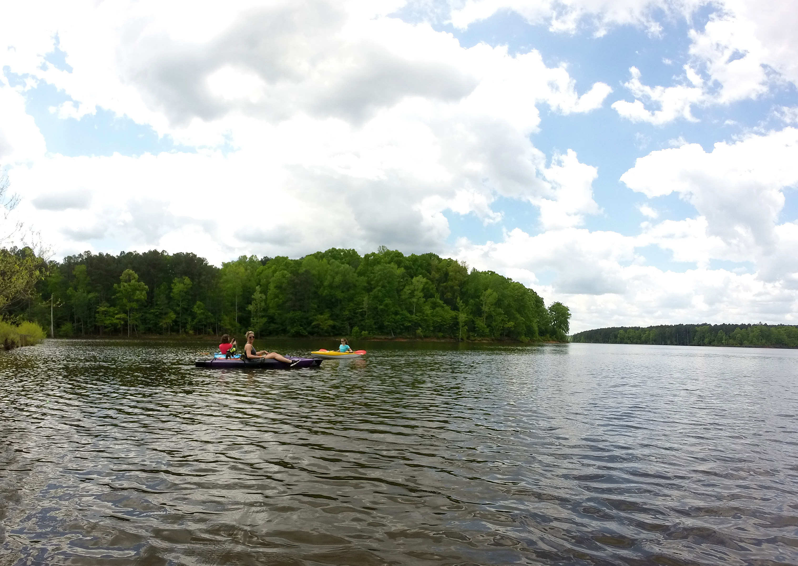 Stacey making sure Isabelle is ready to go on her first kayak trip