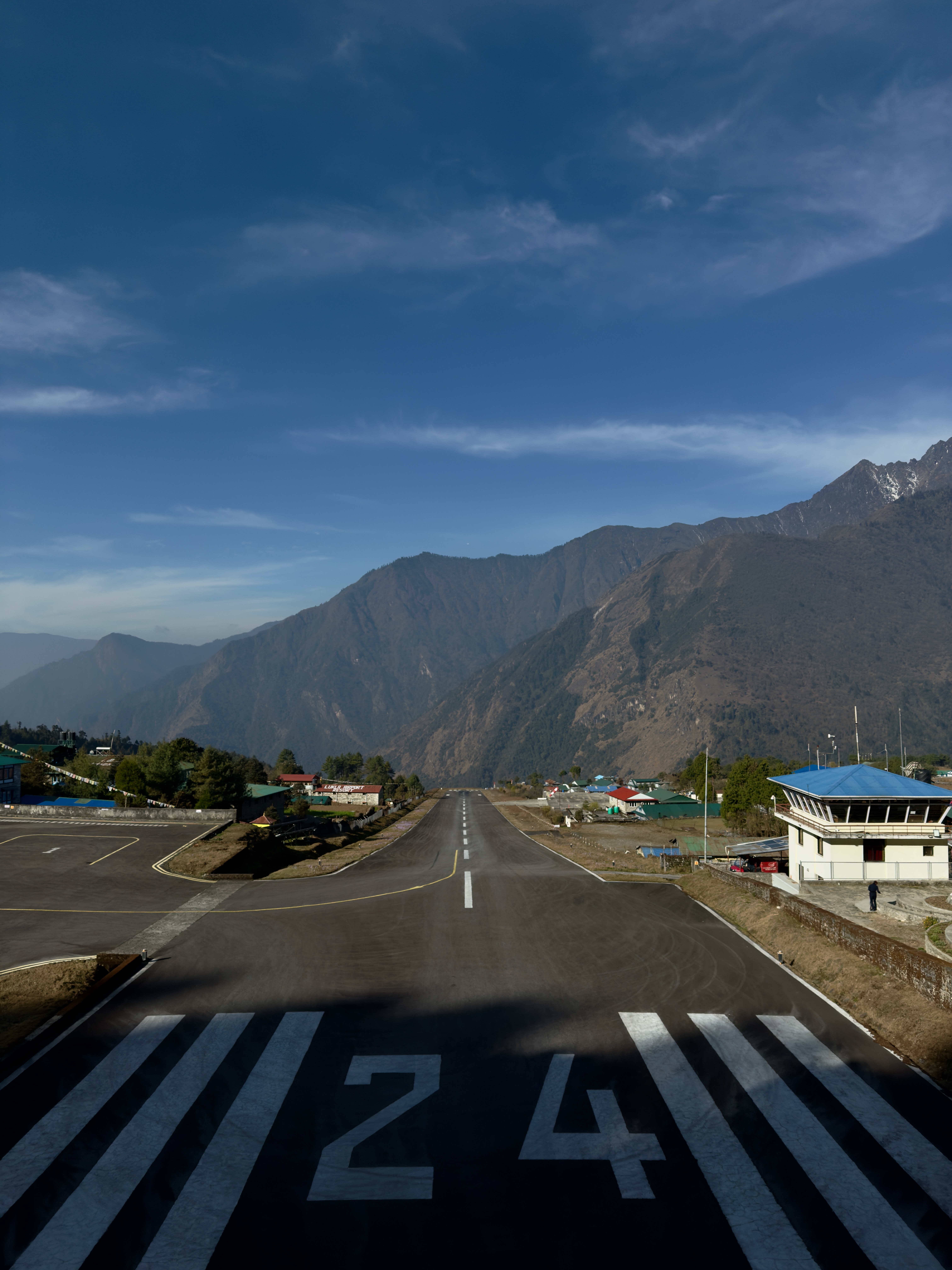 The runway of Lukla Airport in the Himalayas.