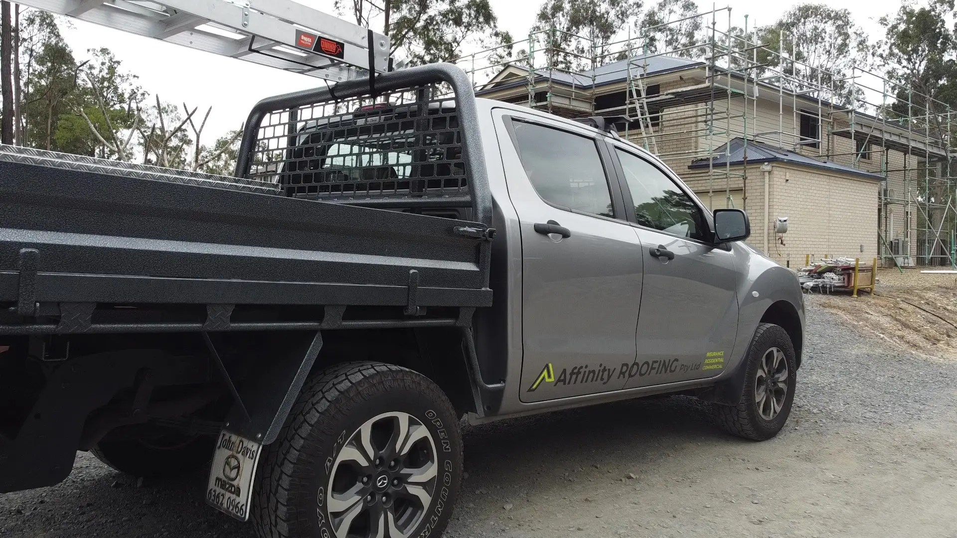 Affinity Roofing branded car on site