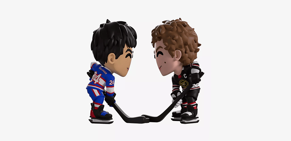 Heated Rivalry action figures facing off