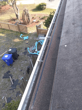 Roof flashing inspection on a coastal North Carolina home