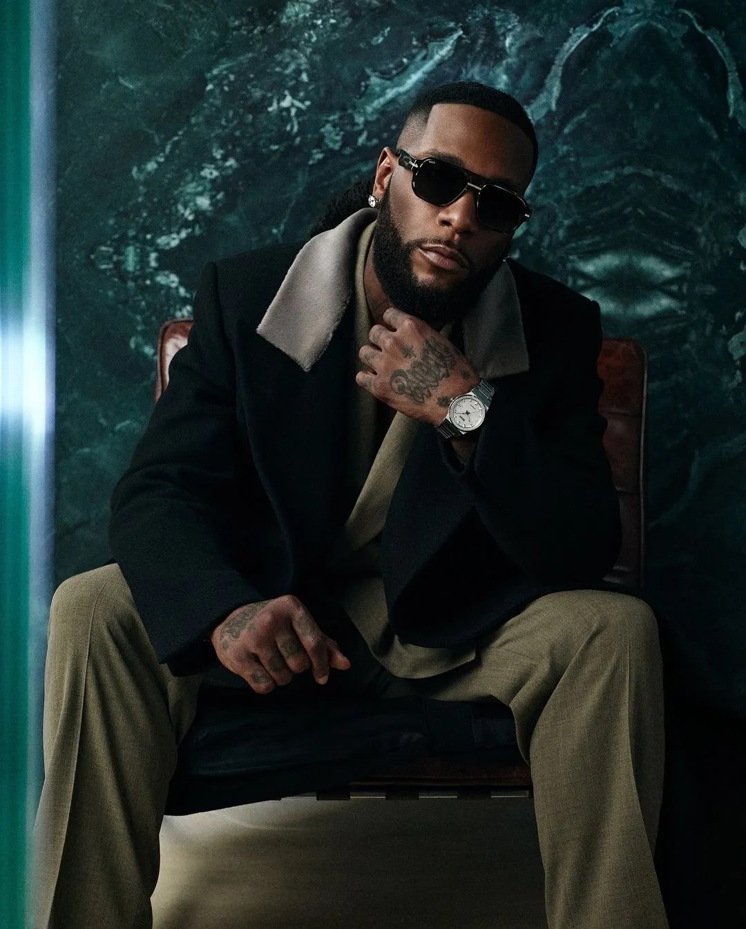 Portrait of Burna Boy for a biography guide on his life and career