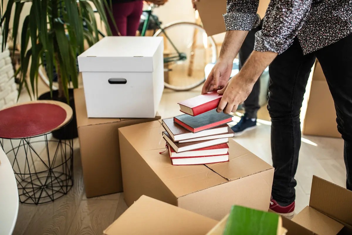 How to Pack Books for Moving Like a Professional A Full Table