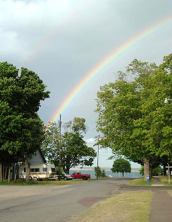 While working the museum one day, a brilliant rainbow formed over Grand Marais bay.