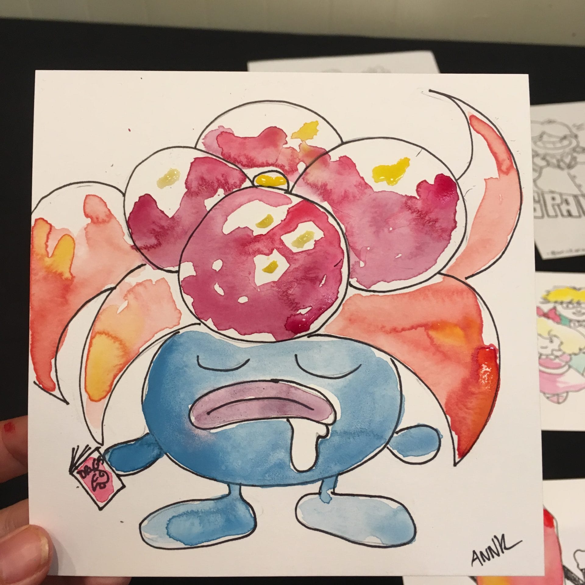 Gloom reading a book on poisonous plants