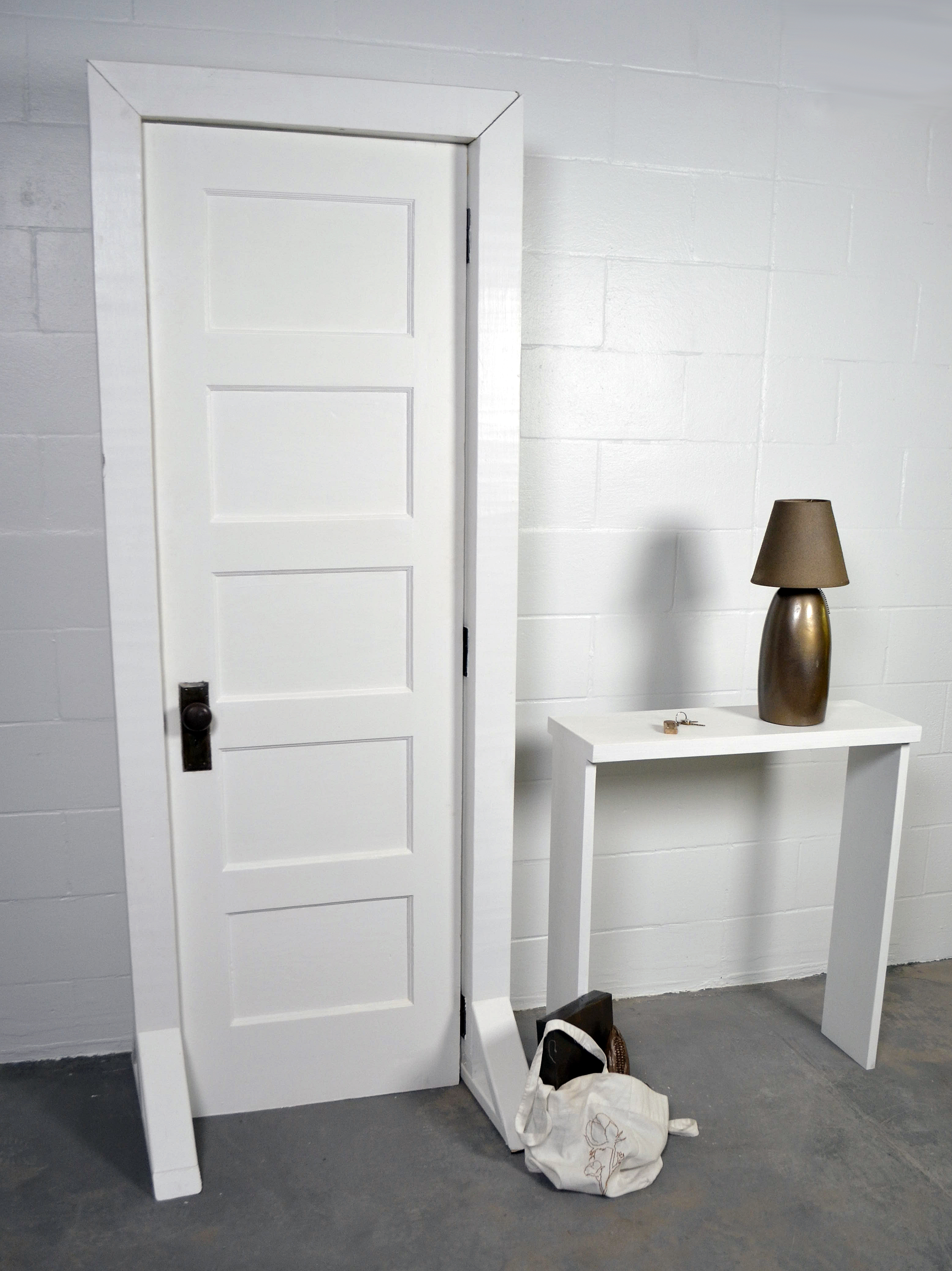 Piece Statement: Over the past couple years there has been an increase of immigration to the US from El Salvador, Honduras, and Guatemala. On a federal level, the US has not received their people well – the opposite can be said about their resources. This installation depicts an entryway scene highlighting the various imports from El Salvador, Honduras, and Guatemala such as: mineral fuels, machinery, electric machinery, cereals (corn), and cotton. This piece brings into question the US’s continuing ironic and exploitative treatment towards immigrants and refugees.