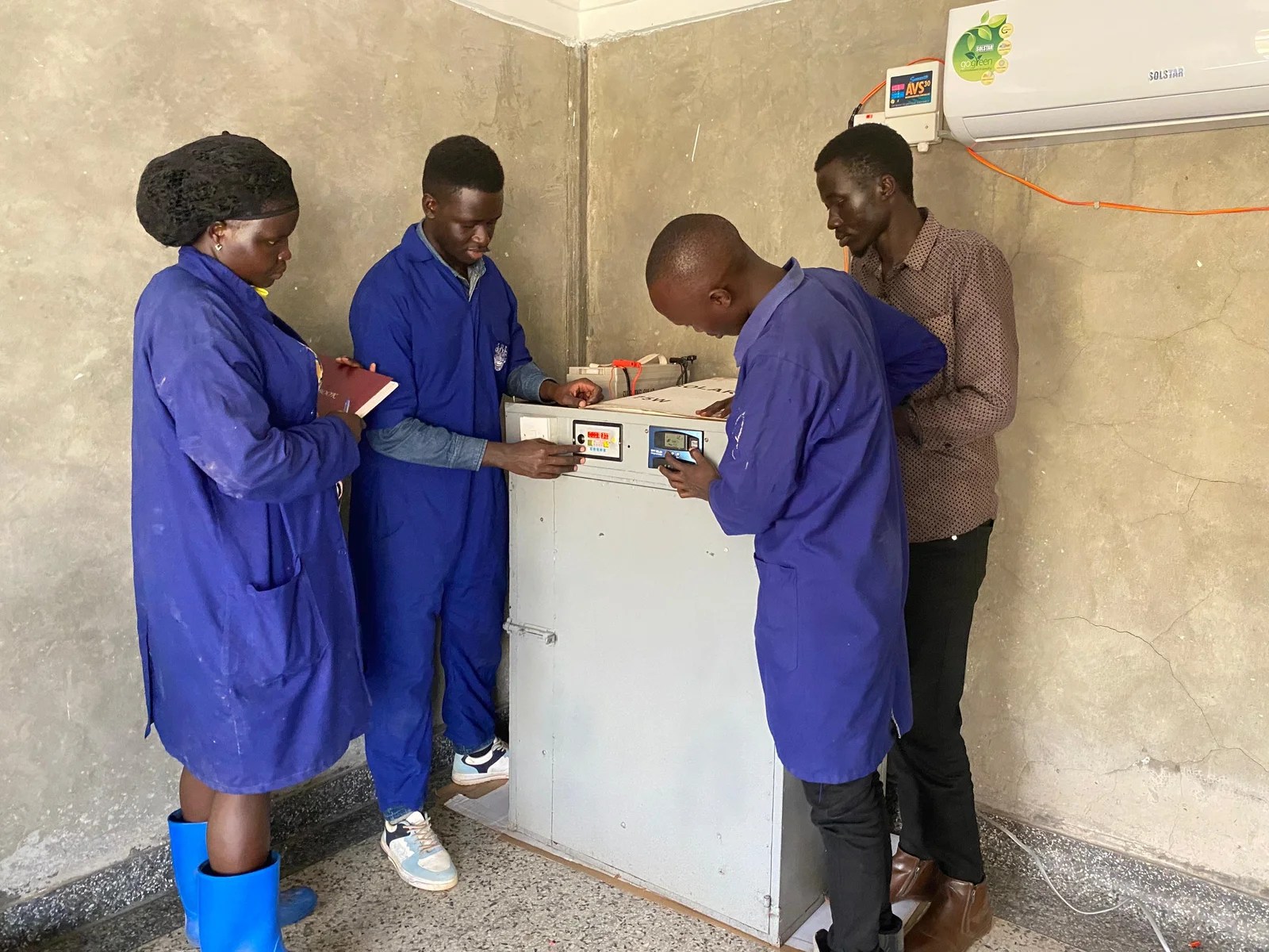 A new Year Gift: Agrovision installs a 240 egg capacity incubator at NARO, MUZARDI