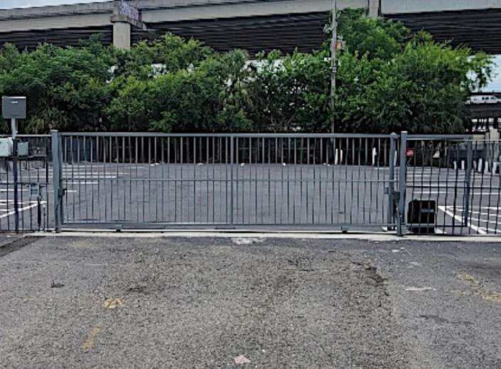 Long Range Iron Gate for a Commercial Parking Lot Long Range Iron Gate for a Commercial Parking Lot