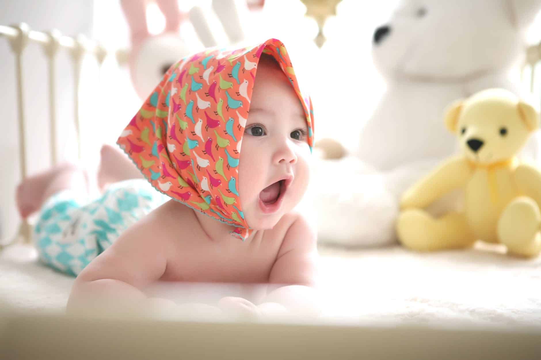 adorable baby beautiful bed