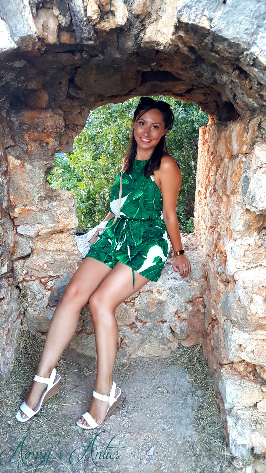 Woman sat in a window of Ali Pasha's castle, Parga