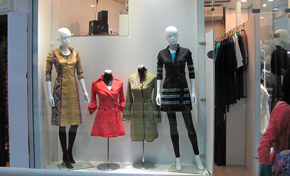 A boutique showcasing trendy manteau, or the long coat typically worn by some Iranian women.