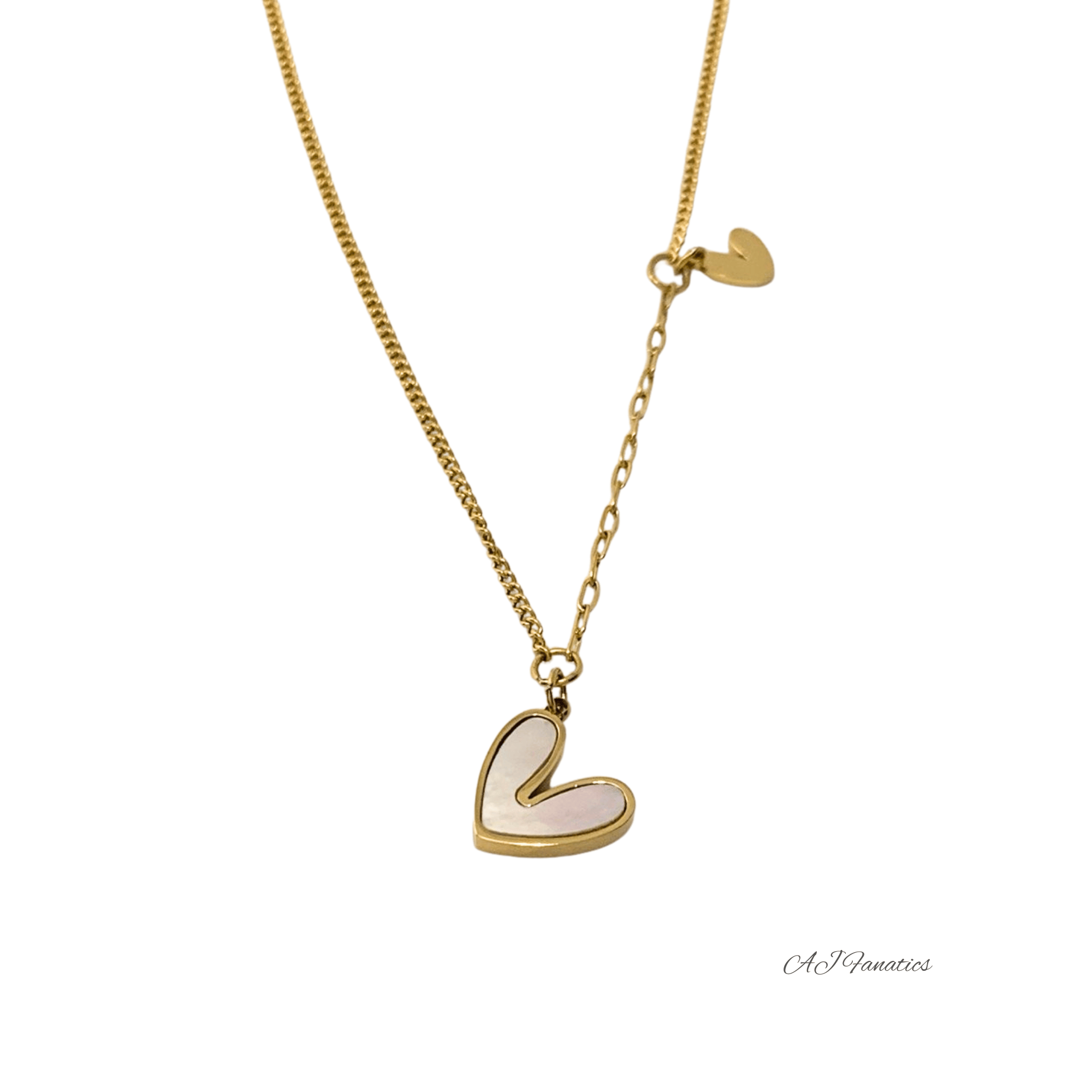 Close-up of a gold-tone Hearts Entwined Pendant necklace with a larger iridescent shell heart pendant and a small solid gold heart charm on a fine chain, displayed on a white background.