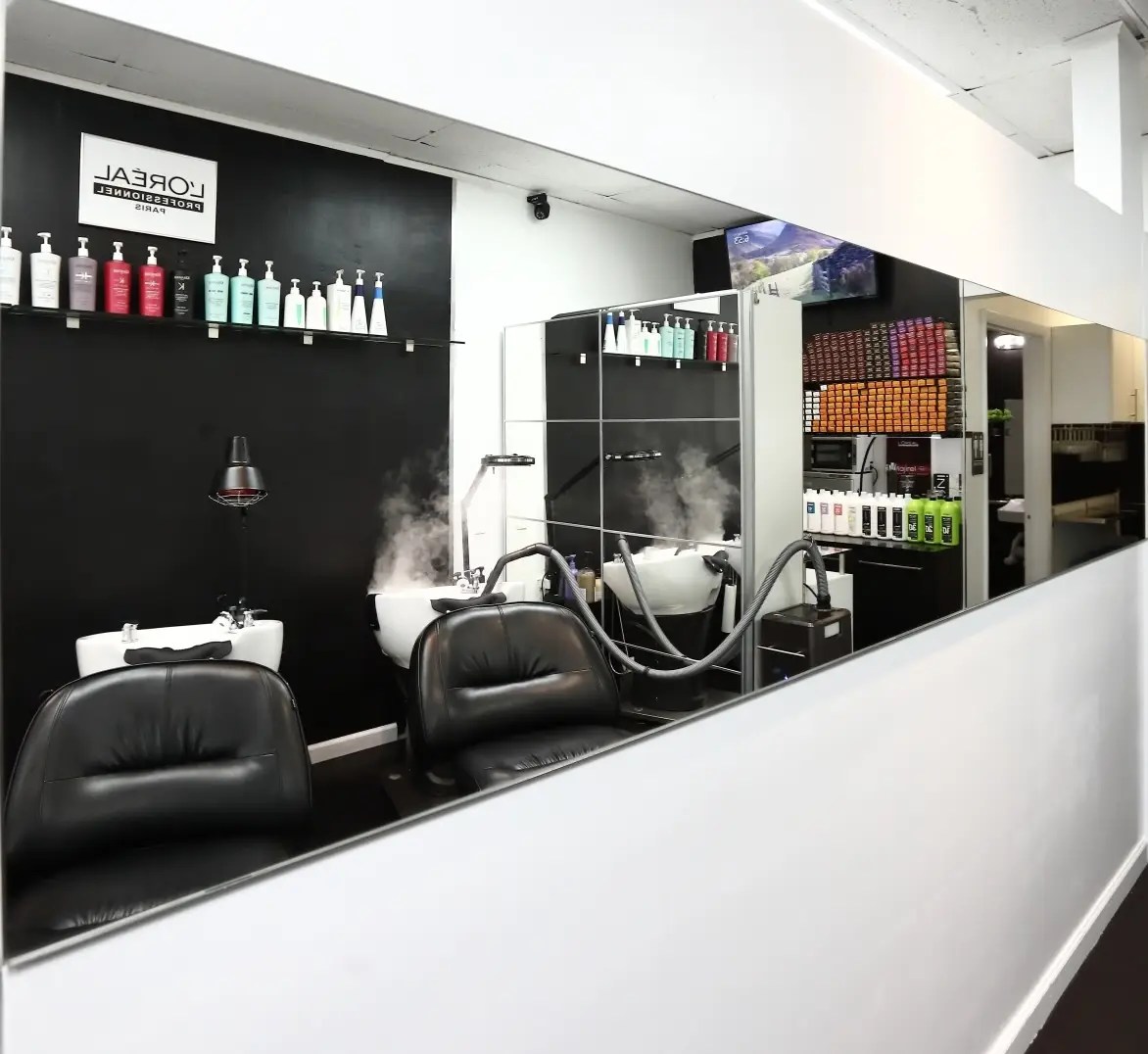Professional hair color service at Albert Robin Salon in Miami