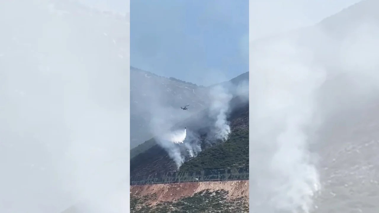 Zjarret në jugun e Shqipërisë/ Era dhe temperaturat favorizojnë përhapjen e flakëve, ndërhyn helikopteri