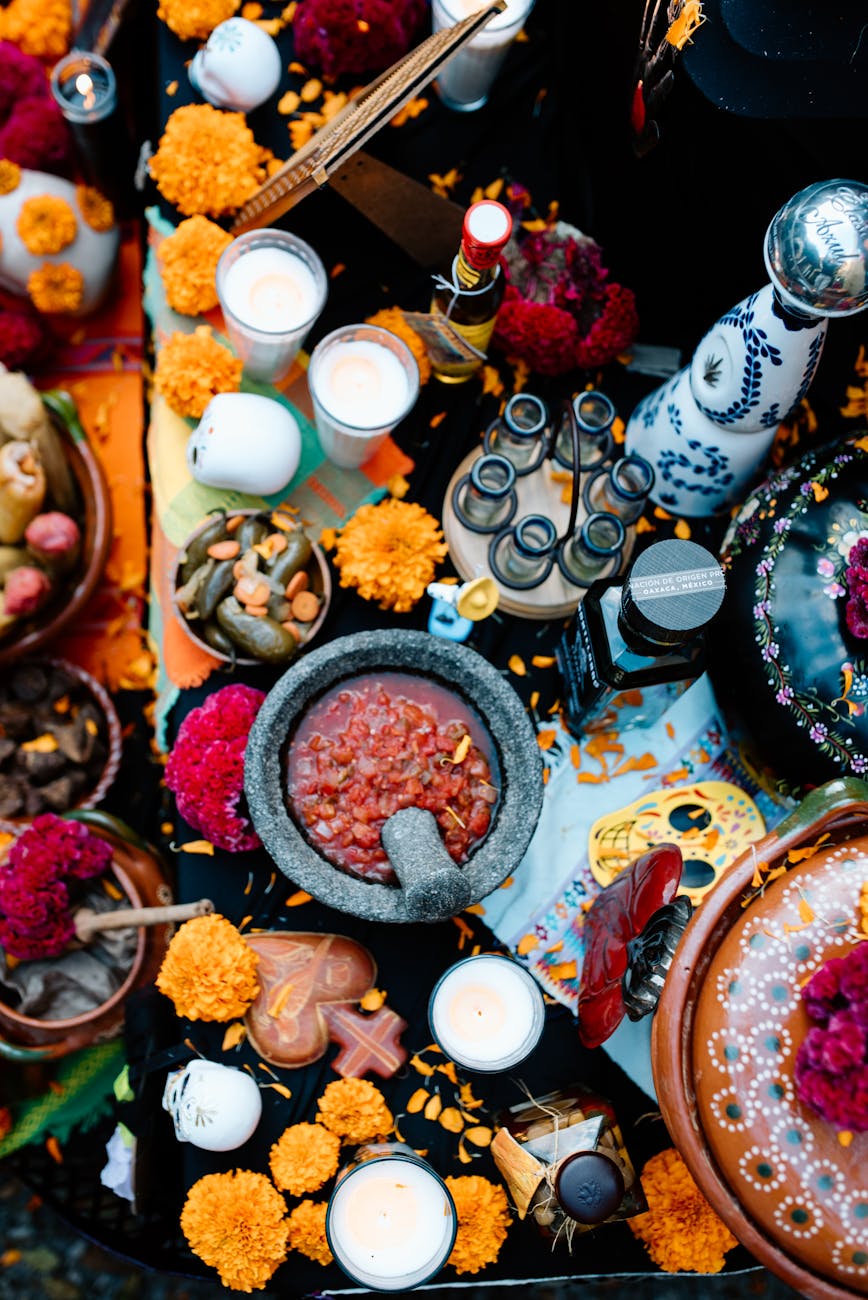 dishes and decorations on a surface with chrysanthemum flowers