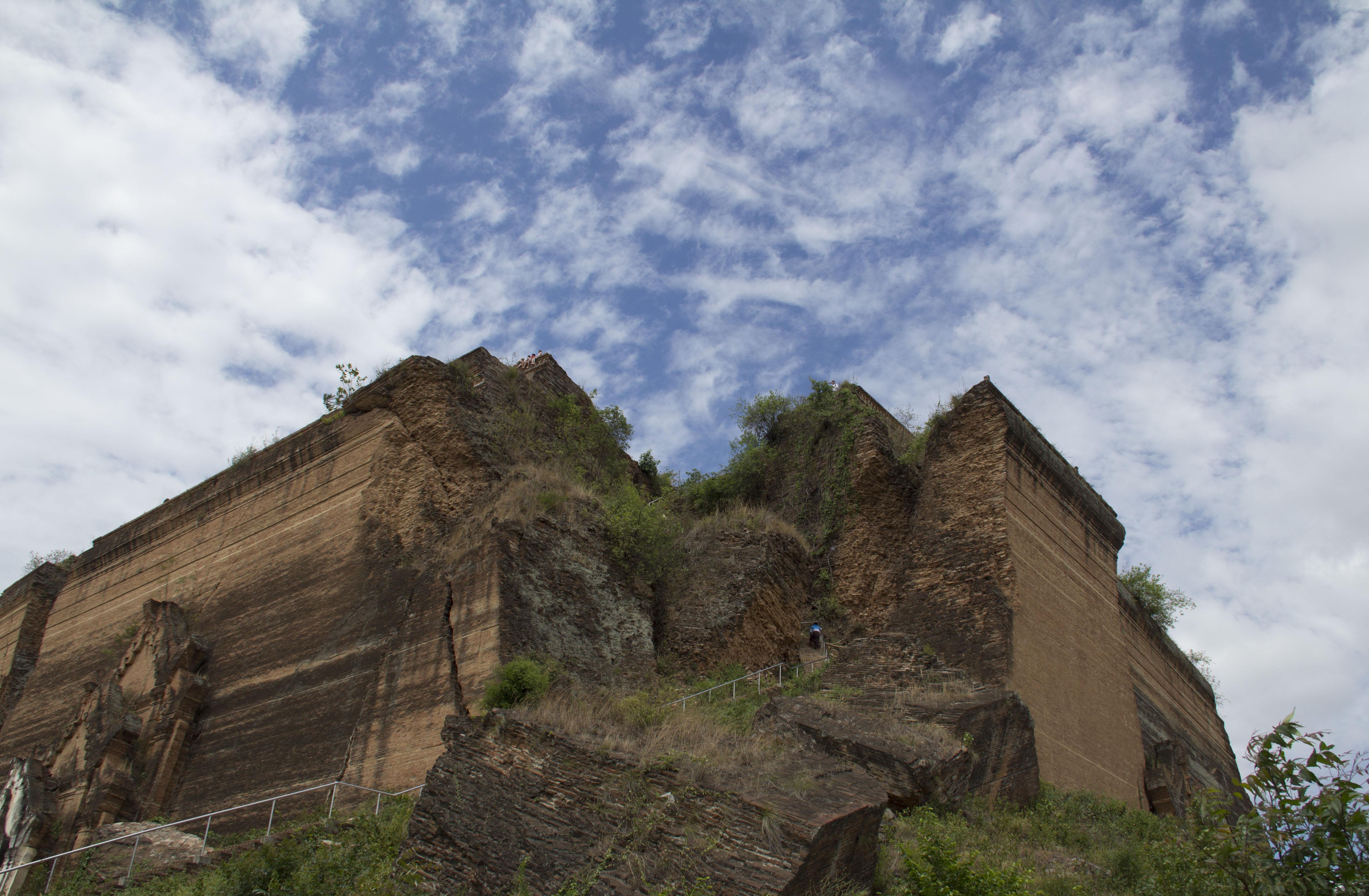 Left corner of Mingun Pagoda, an abandoned project by King Bodawpaya who believed in the prophecy that once its completed, the city would vanish. This is only one third of his vision. We climbed barefoot to the top and scalded every inch of our skin.