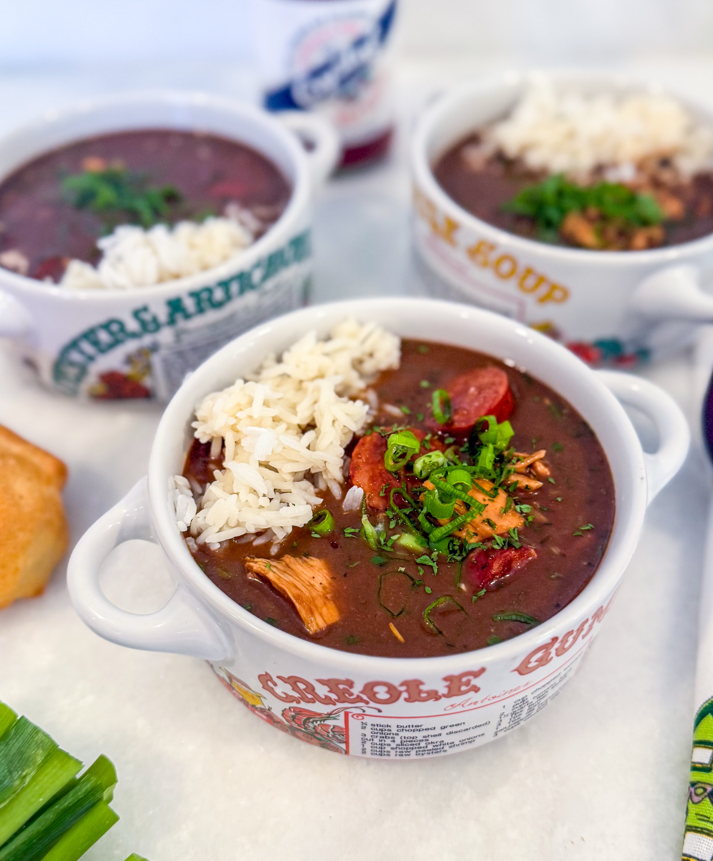 Frozen Chicken & Sausage Gumbo - Creole chicken, smoked sausage, onion, bell pepper, celery, garlic, roux, chicken stock, Creole seasoning, bay leaf, green onions