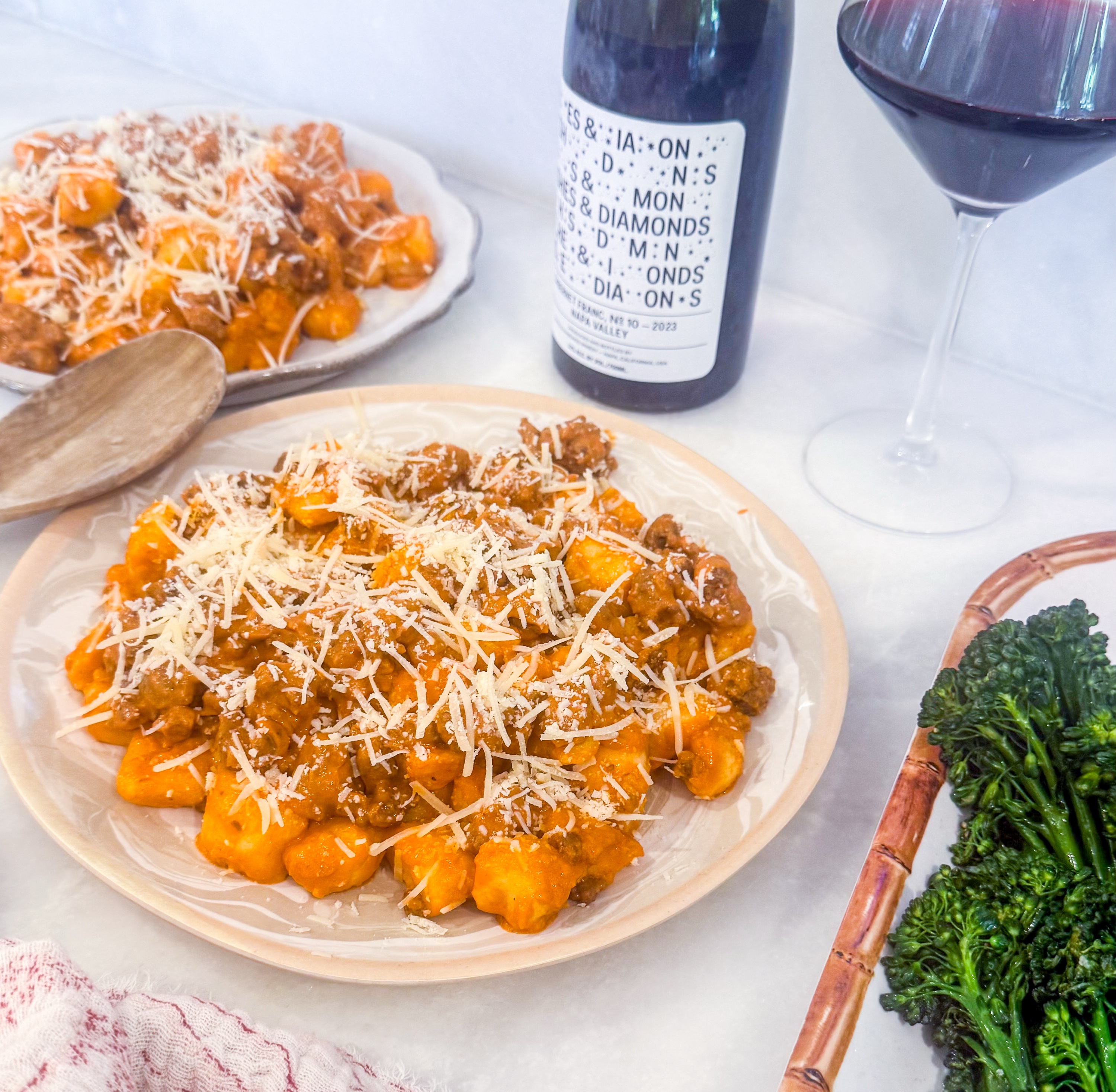 Gnocchi Bolognese - Potato gnocchi with beef Bolognese and Parmesan, served with roasted broccolini