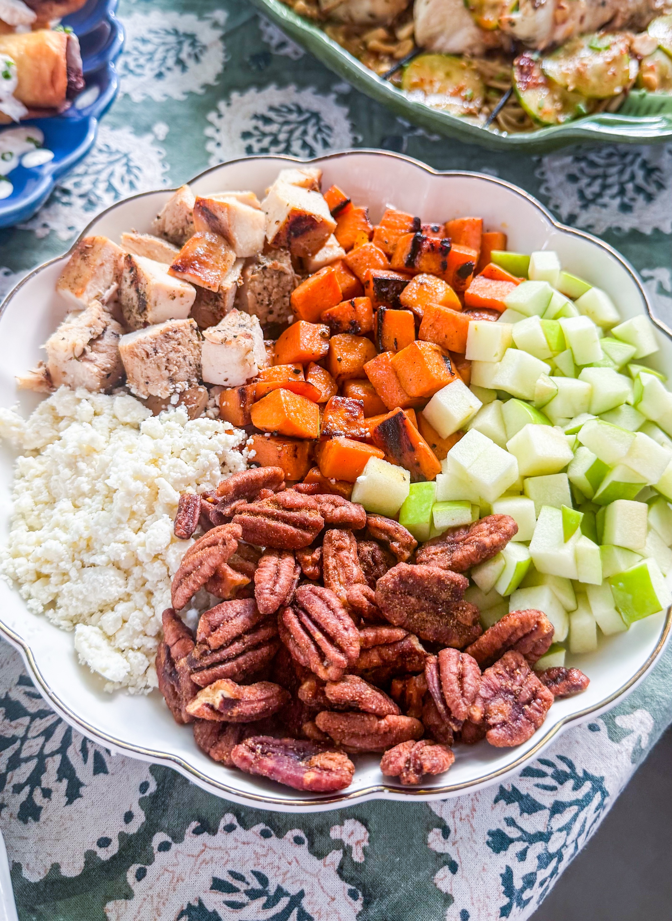 Eat Fit Sweet Potato Harvest Bowl - Roasted sweet potatoes, grilled chicken, apples, feta and spiced pecans with apple cider vinaigrette