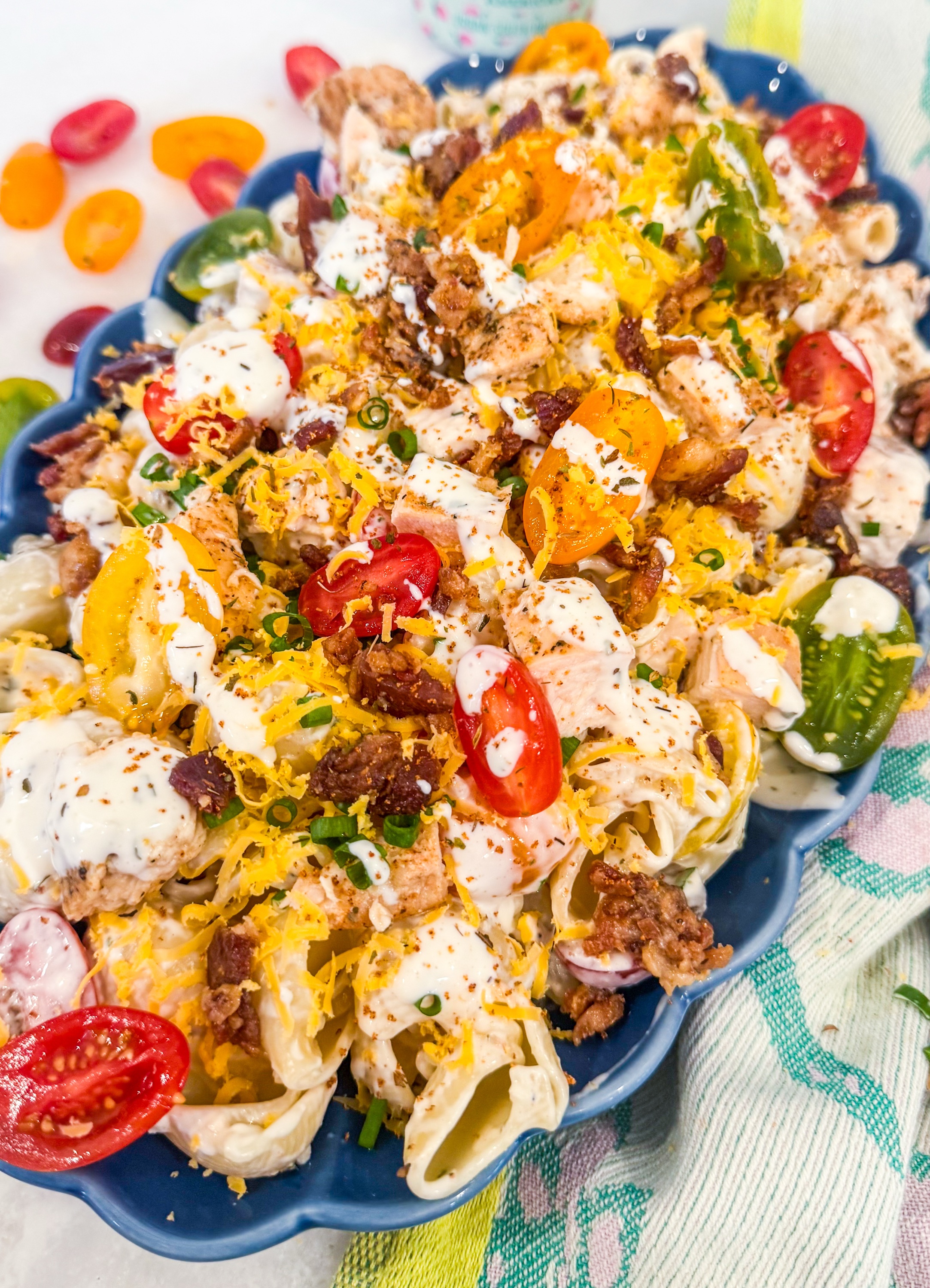 Blackened Ranch Chicken Pasta Salad - Blackened chicken, pipe rigate, bacon, cherry tomatoes, shredded cheddar and scallions tossed in blackened ranch dressing