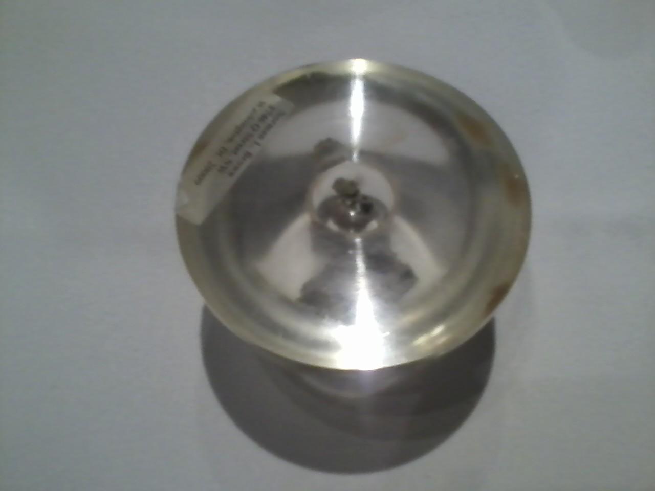 The lucite hemisphere on the table