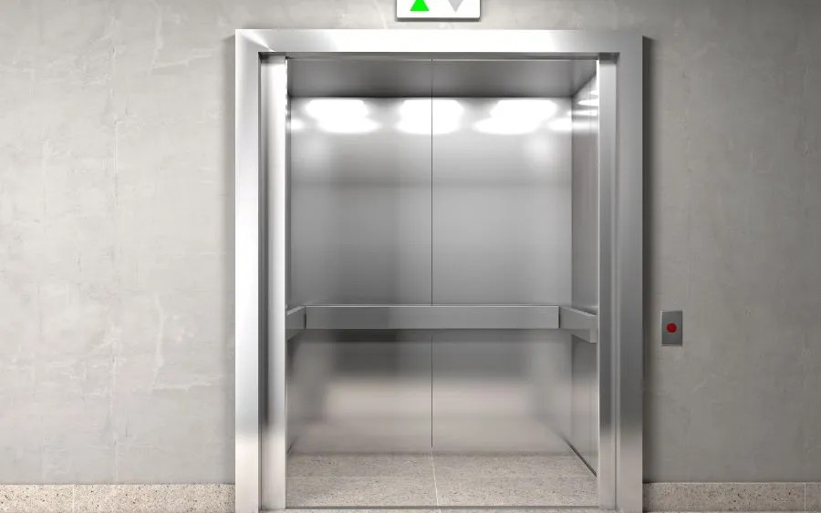 Modern Otis elevator with open doors representing reliable maintenance and smooth vertical transportation