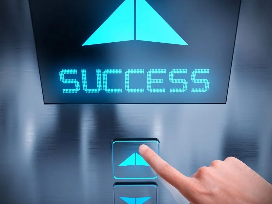 Hand pressing an elevator button symbolizing elevator lifespan, modernization, and future upgrades