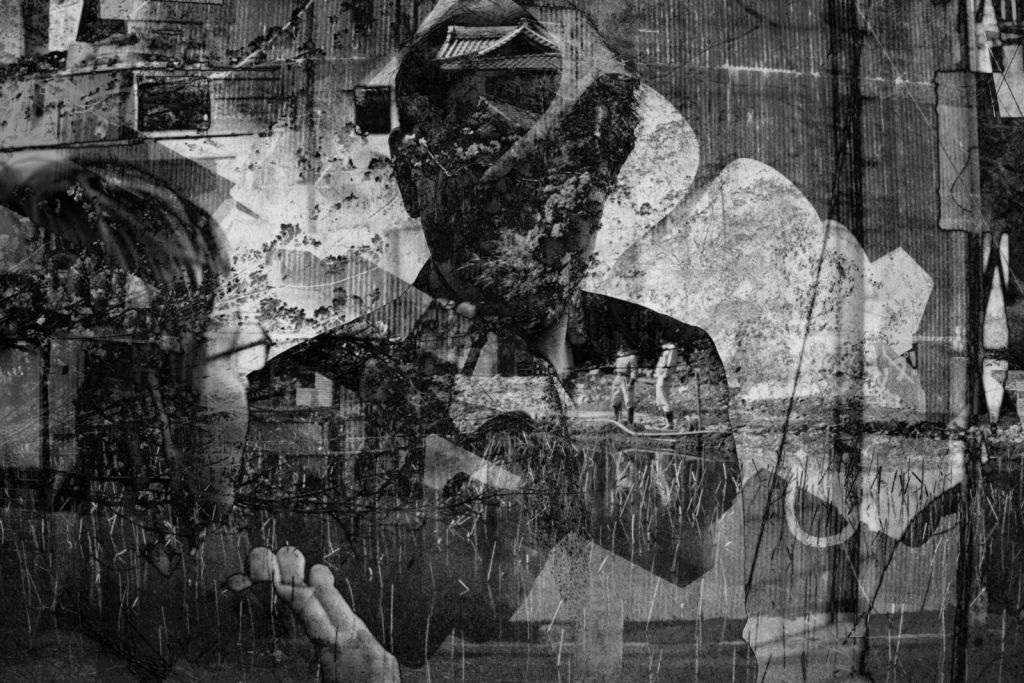 Black-and-white layered photo-montage with a large bowed human figure in a jacket and tie, a female face in profile at the left edge, an open hand in the foreground, and fragments of blossom, reeds, branches, roofline and weathered surfaces.
