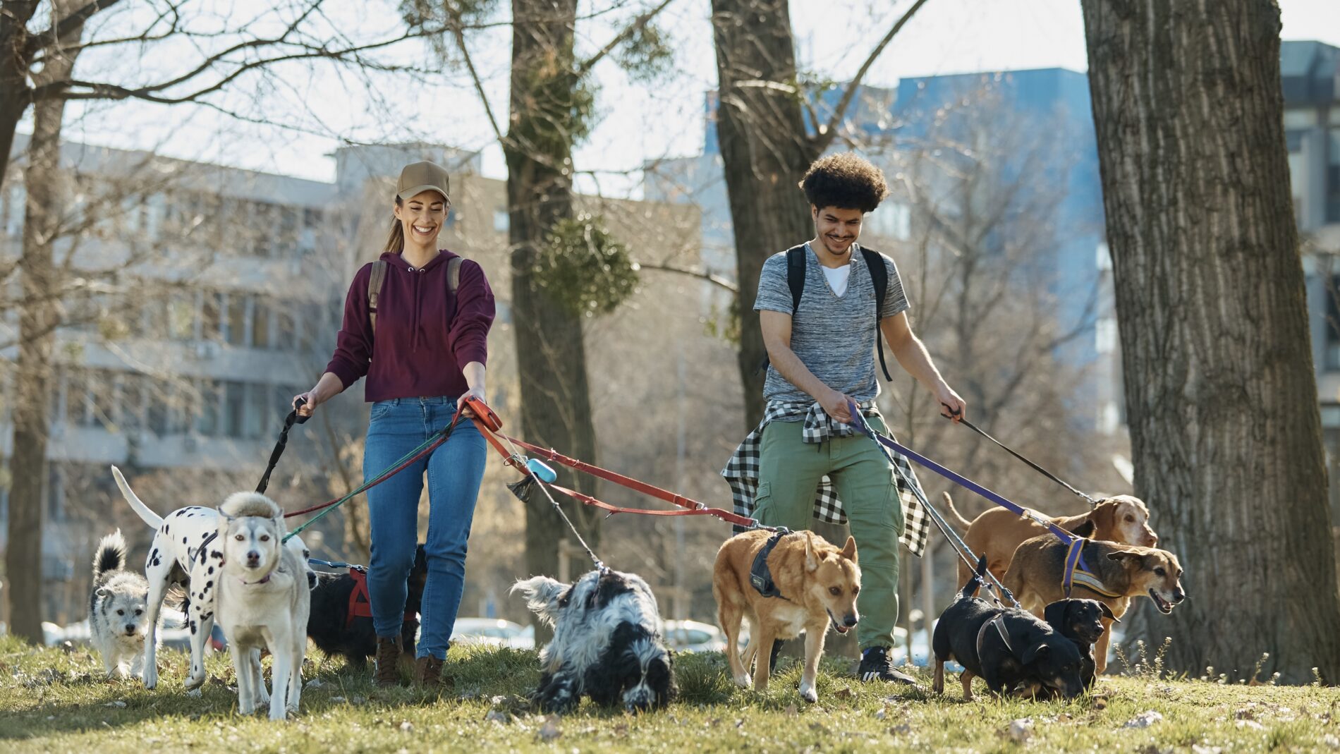 Happy pet sitters with All About Spot pet records.