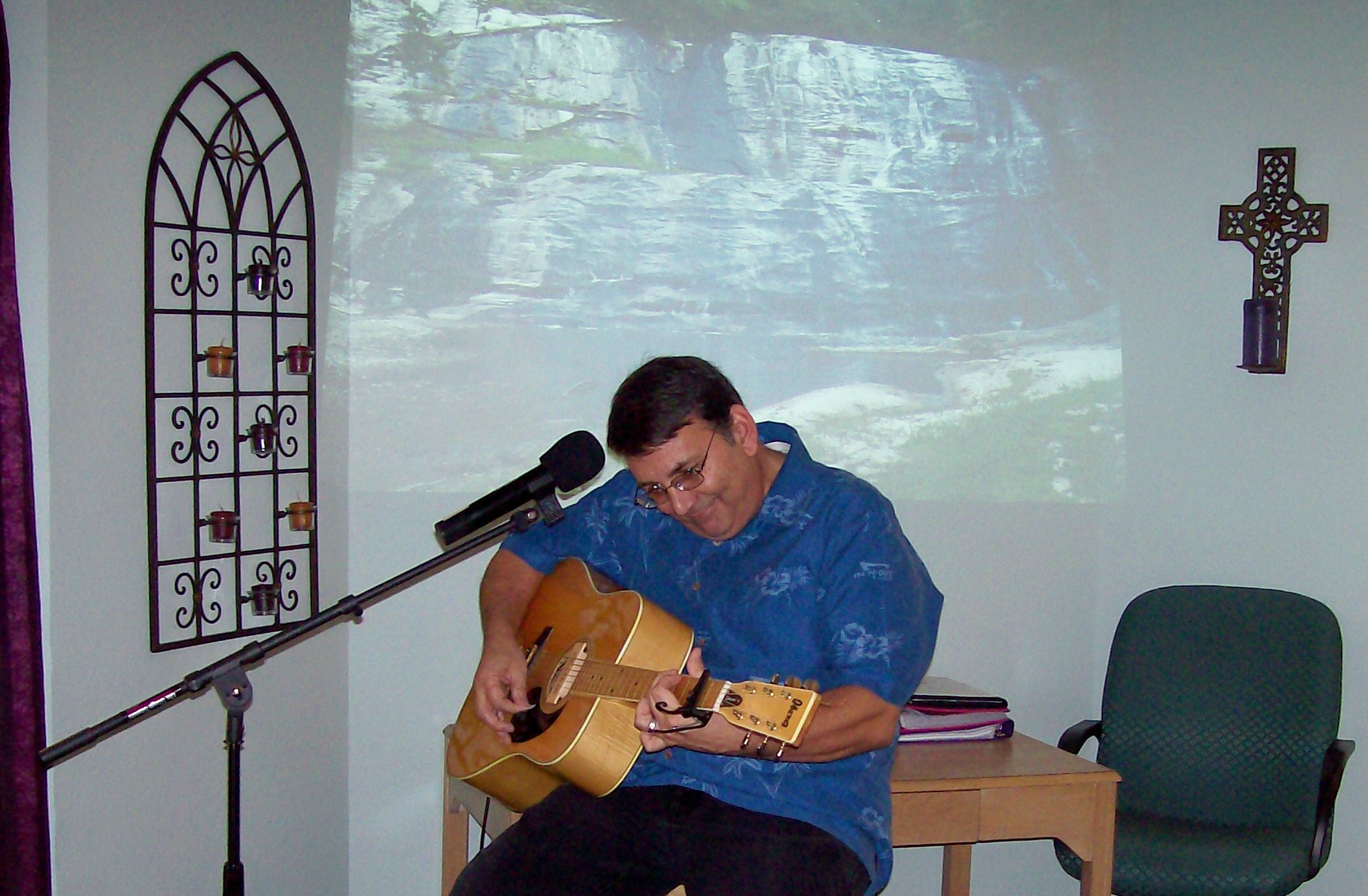 Pastor Dick playing his guitar before our 2nd seminar in Albuquerque