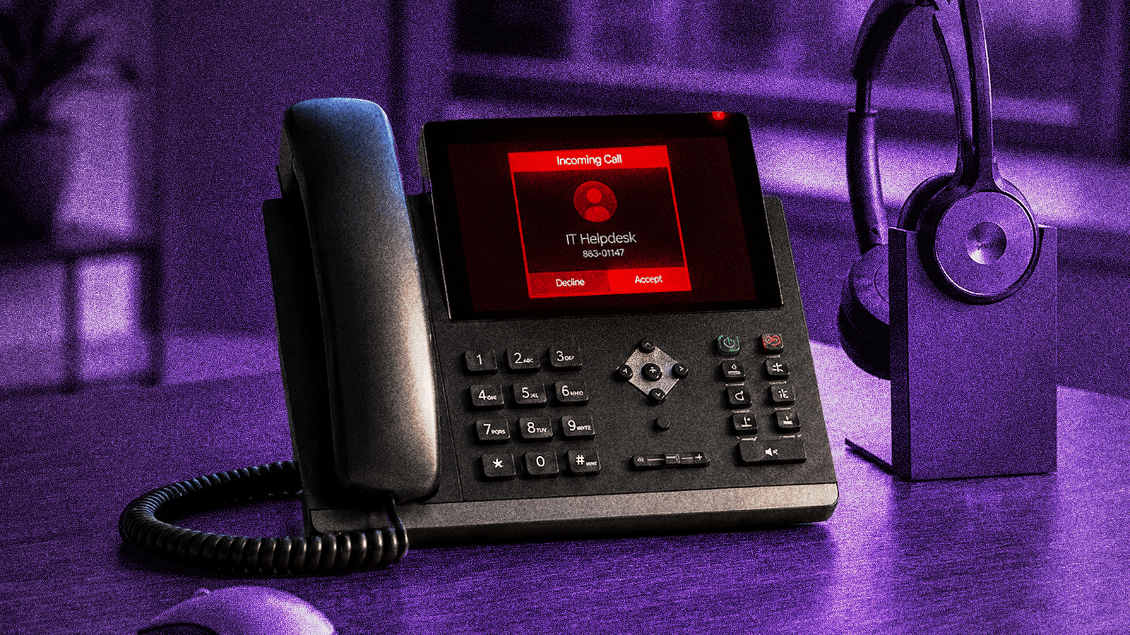 Office desk phone showing a suspicious incoming IT helpdesk call, illustrating a pretexting social engineering attack.