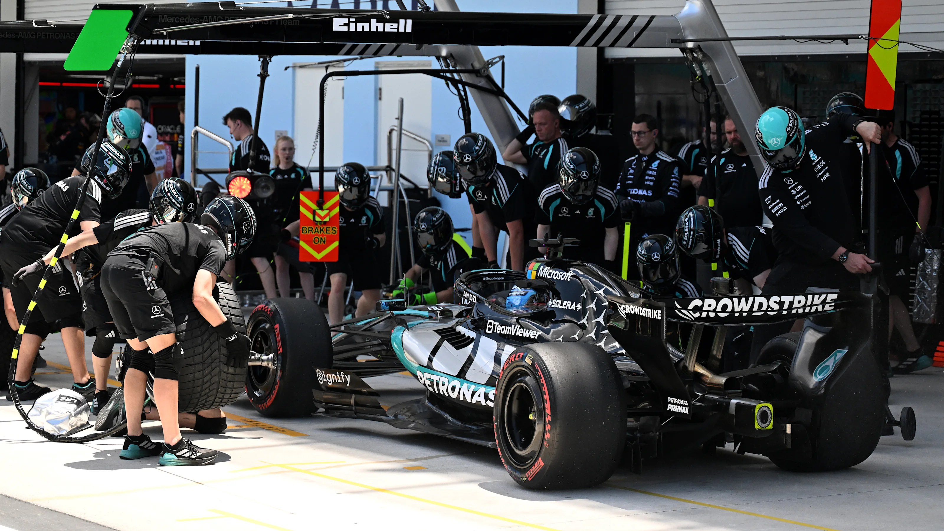 MIAMI, FLORIDA - MAY 01: George Russell of Great Britain driving the (63) Mercedes AMG Petronas F1