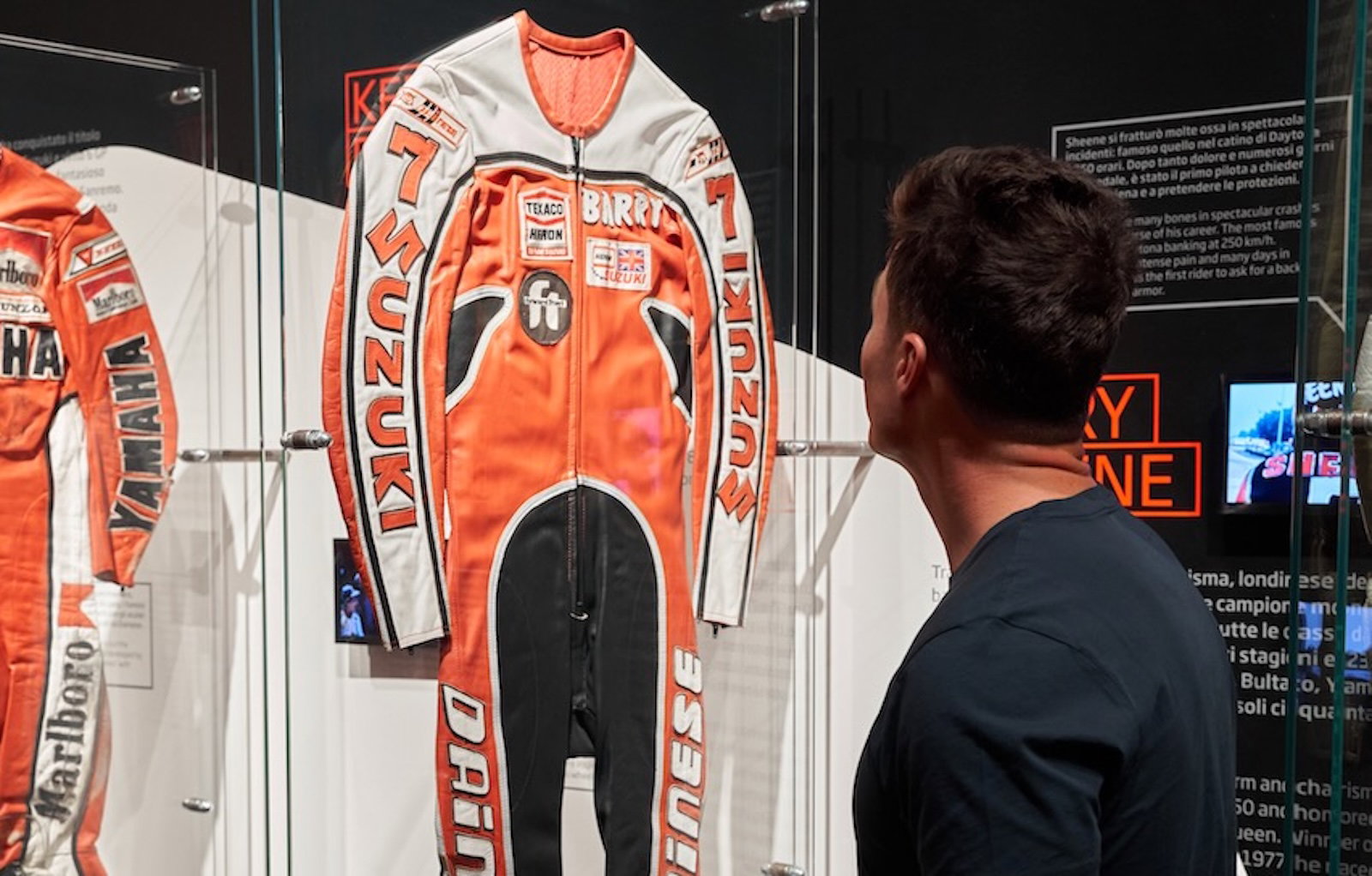 Freddie Sheene looking at some of his father's Dainese leathers